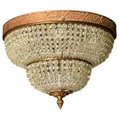 A fine bronze pendant with beaded dome.