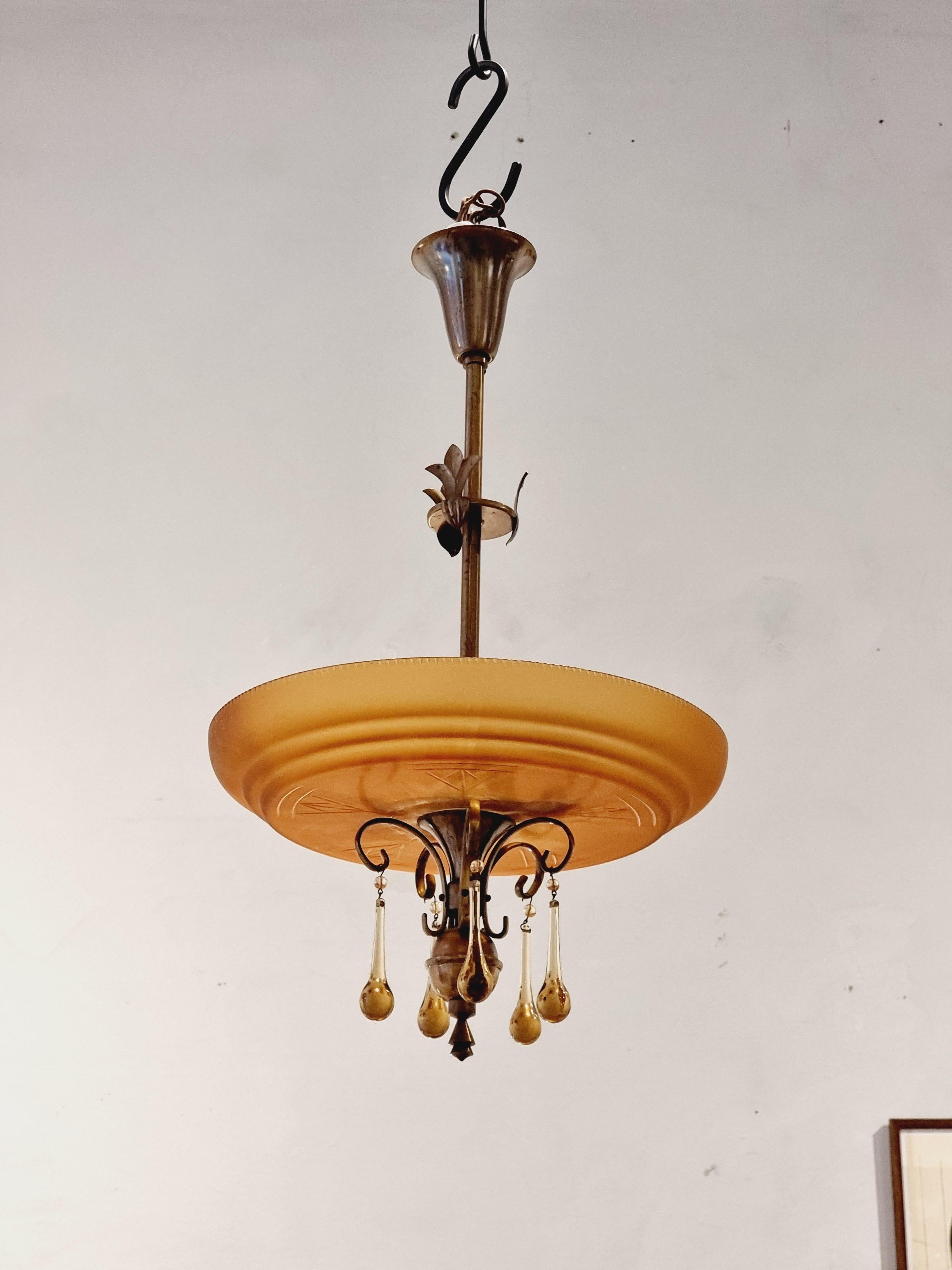 A beautiful, delicate ceiling light attributed to the glassmaster Simon Gate, and designer Harald Notini for Böhlmark. Glass attributed to Orrefors, also inte the manner of Pukeberg, Sweden. Both Notini and Gate are known for their beautiful quality