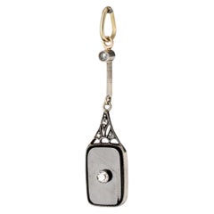 Pendant in Gold, silver and diamonds.
