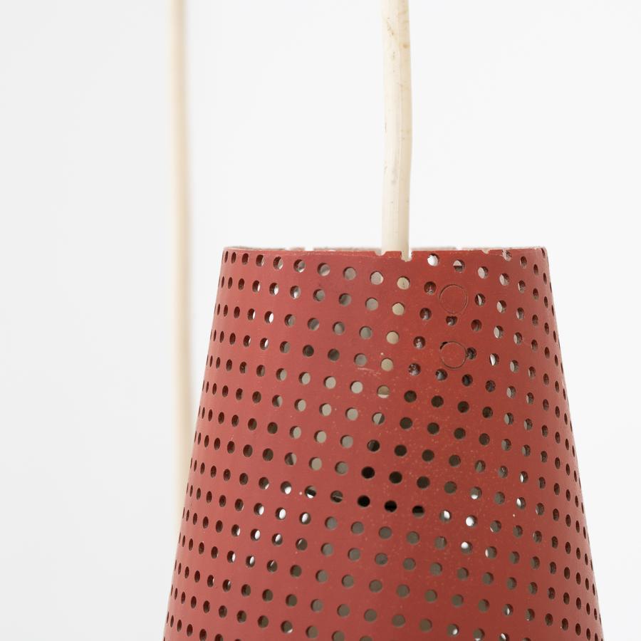 Pendant in brass with six different colored screens in perforated metal. Unknown design.
