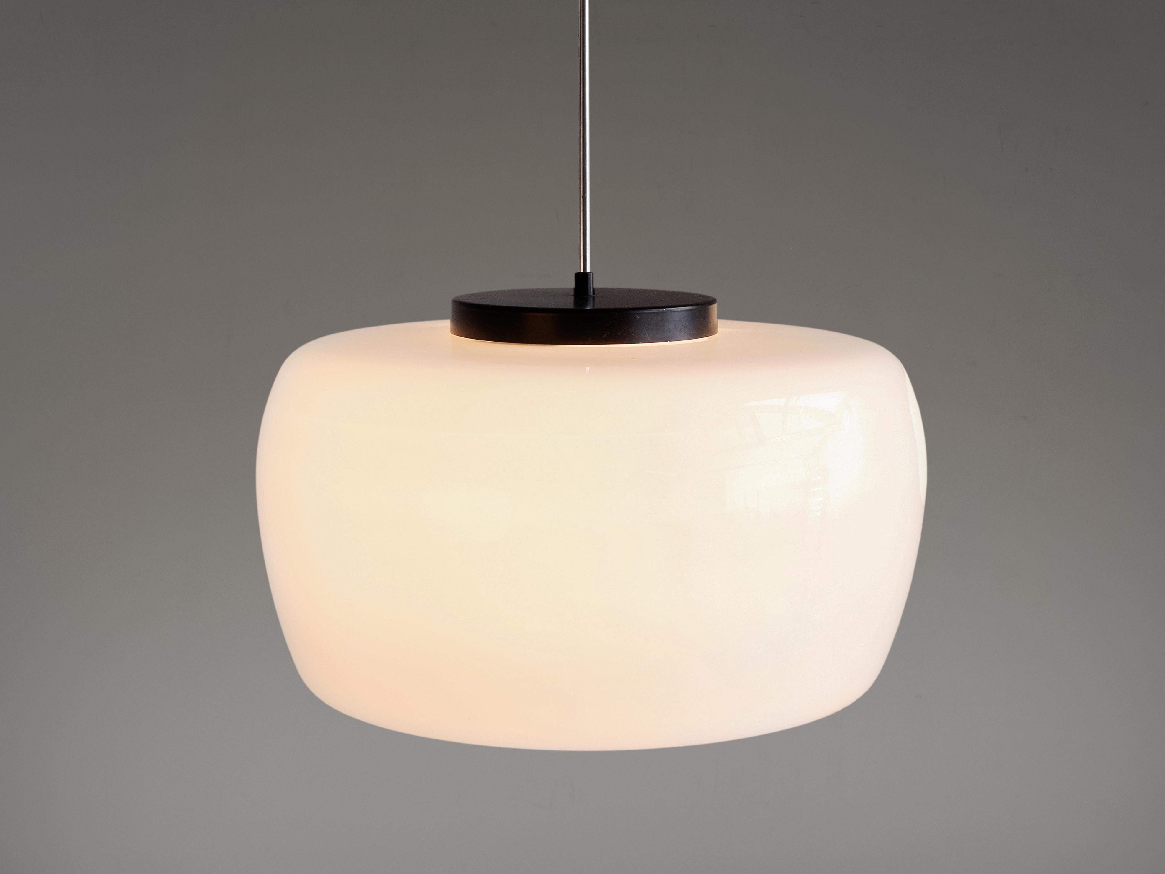 Pendant, opaline glass and metal, European, 1960s. 

Pendant in opal. Great globe shade with flattened top and small opening in the bottom. Black coated top and canopy, metal stern. The pendant provides an extensive light, evenly distributed
