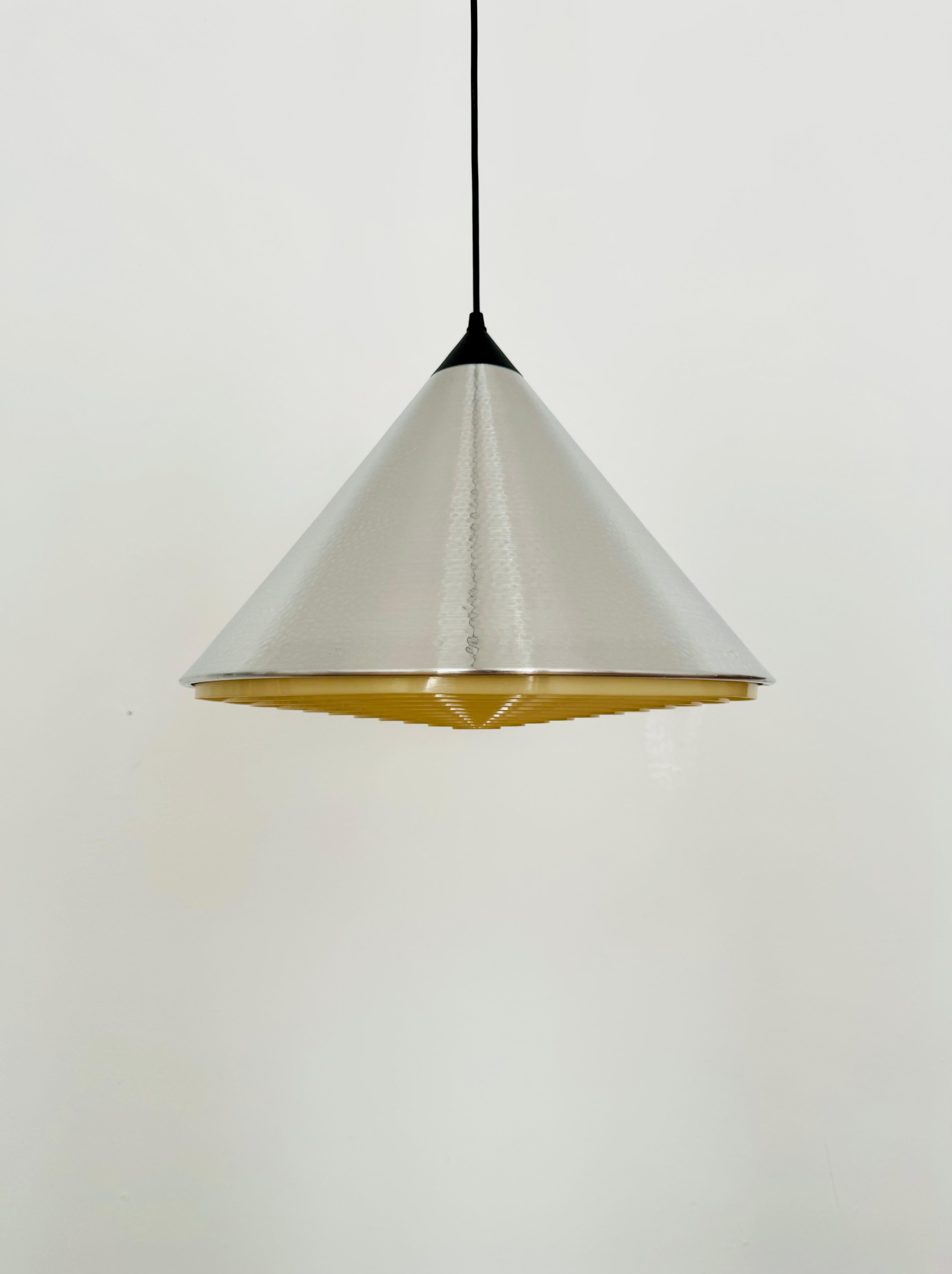 Very nice pendant lamp by Doria from the 1960s.
The plastic reflector creates a wonderful light.
The surface has a hammered look.
Impressively beautiful and contemporary design.

Manufacturer: Doria

Condition:

Very good vintage condition with