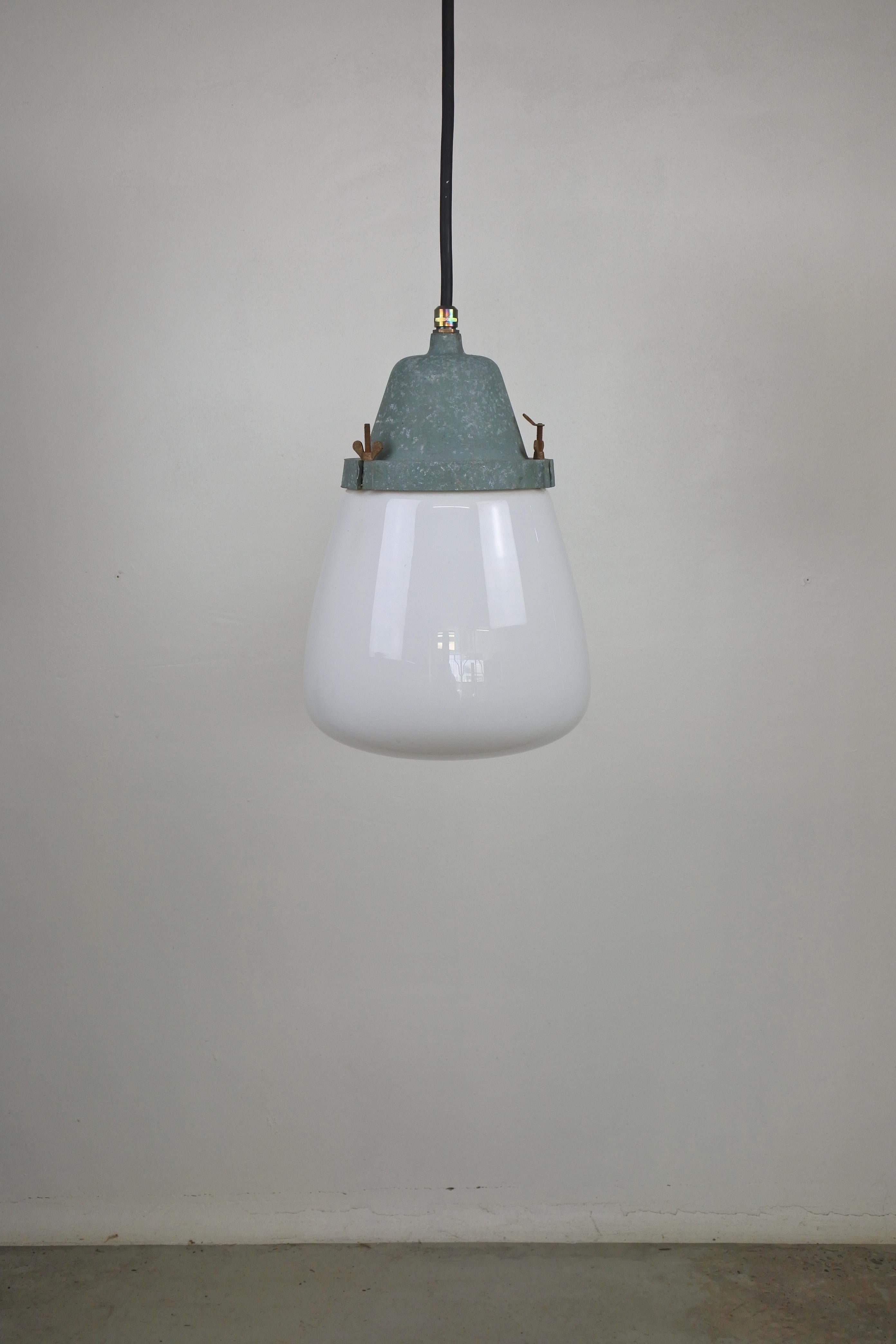 Pendant light by Paavo Tynell
Model 2303-5
Manufactured by Taito Oy in the 1930s

Marked accordingly

Measurements:
As shown: Height 120 cm, Diameter 30 cm
Max cable height 240 cm
Just the lamp Height 45 cm, Diameter 30 cm

Literature: