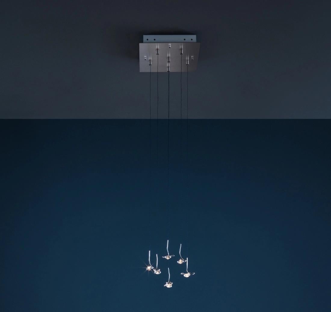 Il lampadario Jackie O è stato originariamente concepito in seguito alla richiesta di un architetto che voleva posizionare la luce 