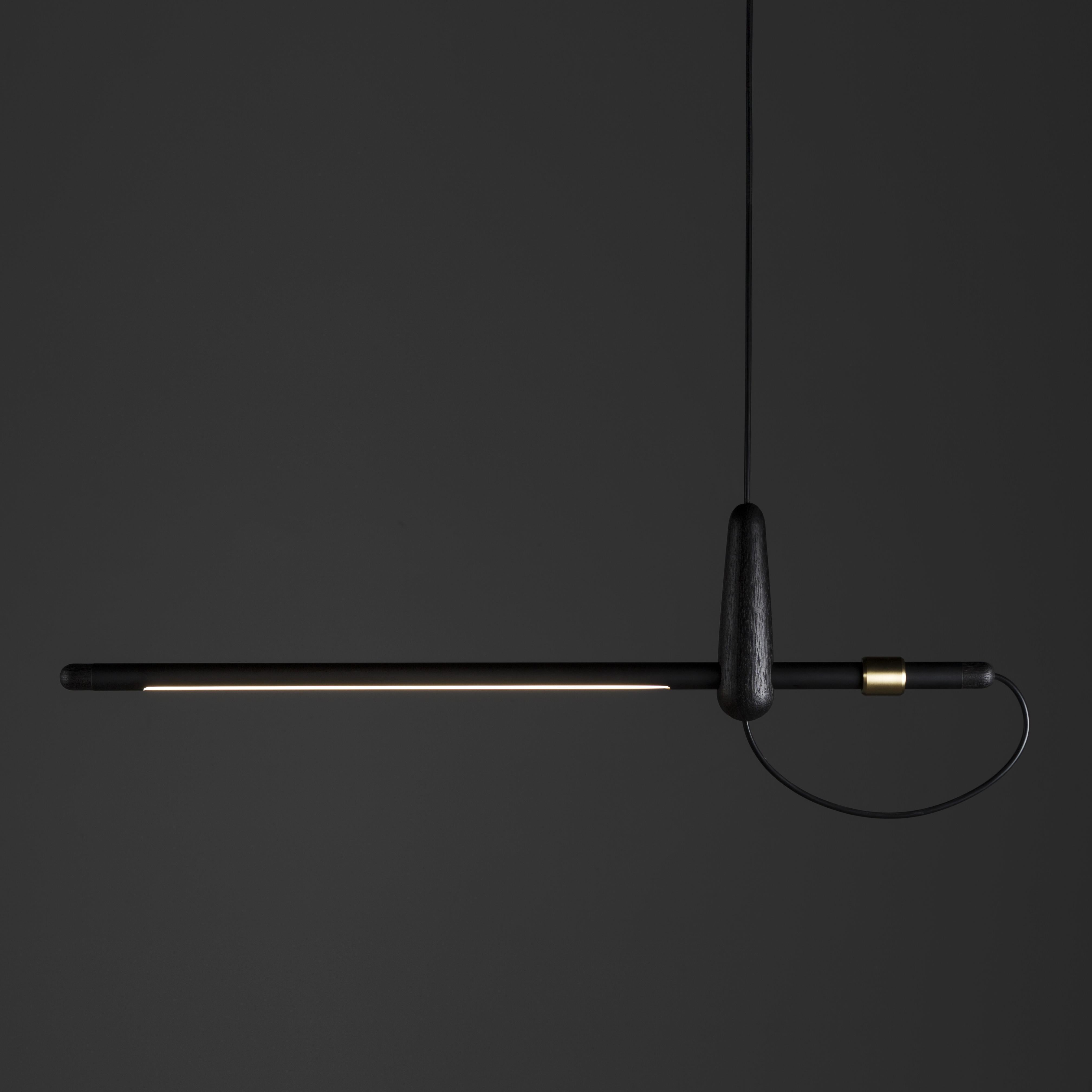 The pendant lamp Costureira is handcrafted in solid Brazilian hardwood Freijó carbonized and counterweight in brass.
The piece represents the Brazilian contemporary design.
- 360º adjustable light focus
- LED 10w
- 3.000 K - color temperature.