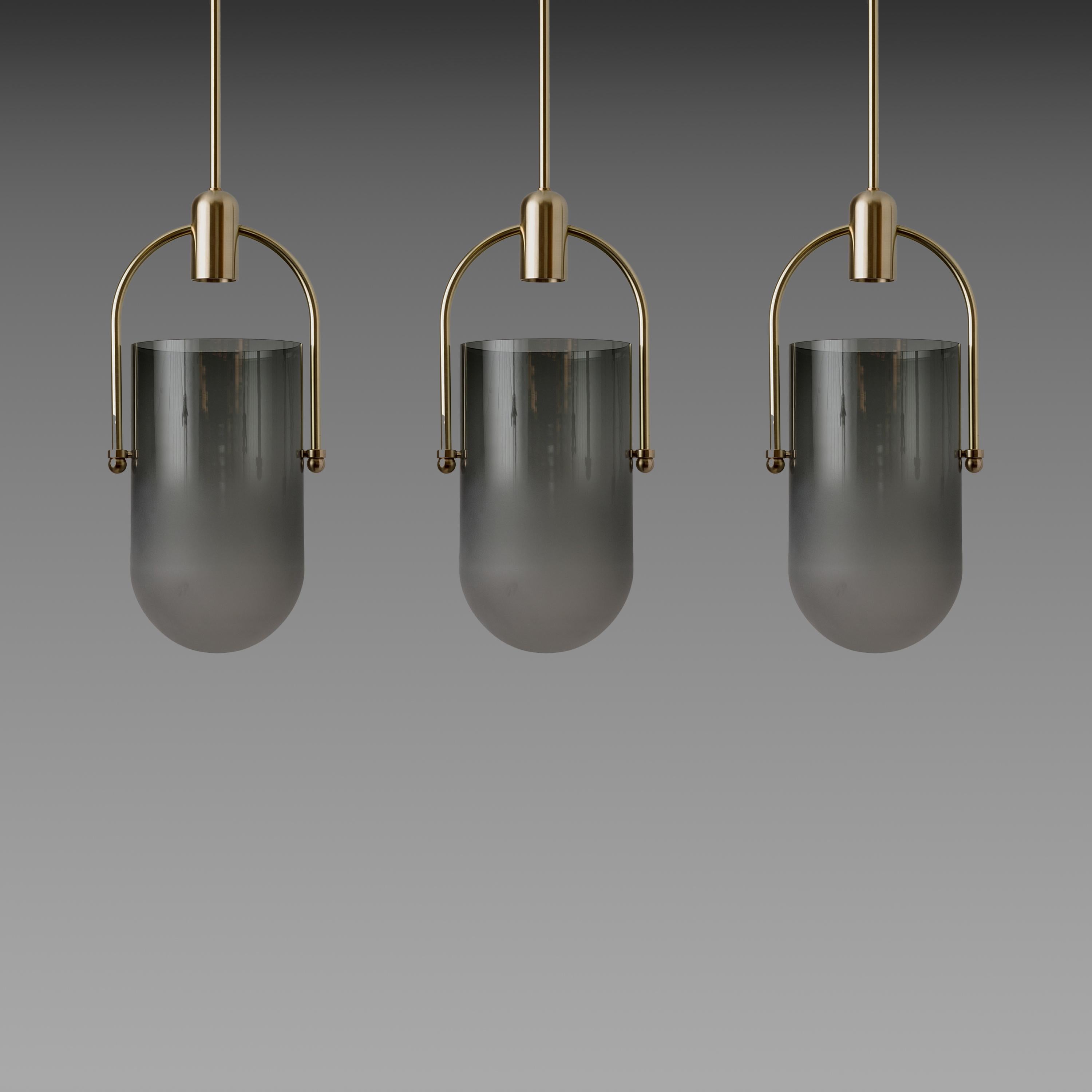 The Arc Well pendant lamp by New York-based lighting studio Allied Maker is a focused study in contemporary lighting design and technical craftsmanship.

Handcrafted in the USA, it pairs precision-machined solid brass hardware with a mouth-blown