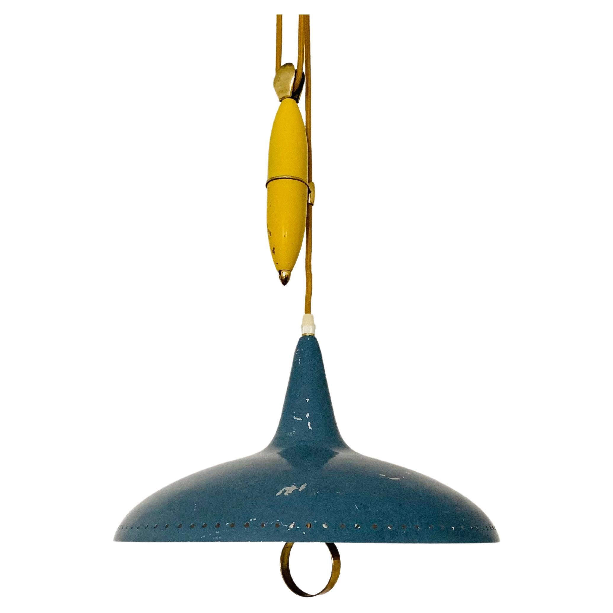 Pendant lamp with counterweight For Sale
