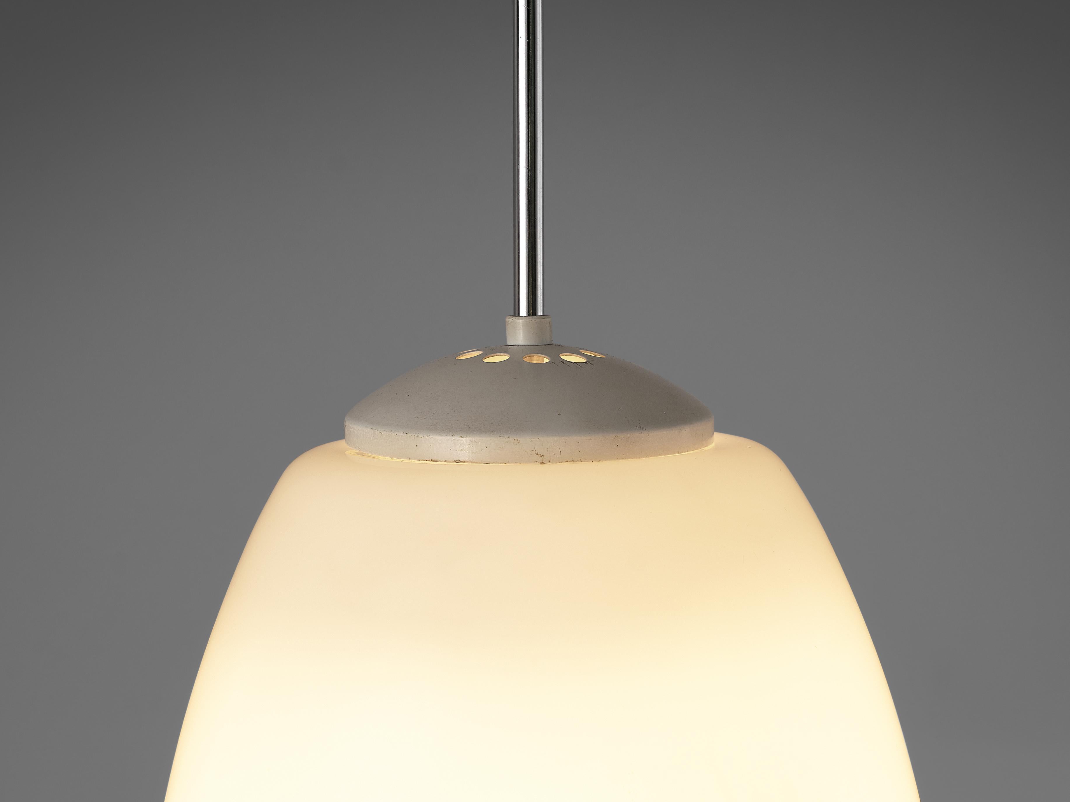 Pendant lamps, metal, opaline glass, plastic, Europe, 1970s

Minimalist pendant lamps with drop-shaped glass shade. The lamps hang on metal stems that end in a cylindric ceiling fixture. The well-balanced, elegant shape of the lamp surrounds the