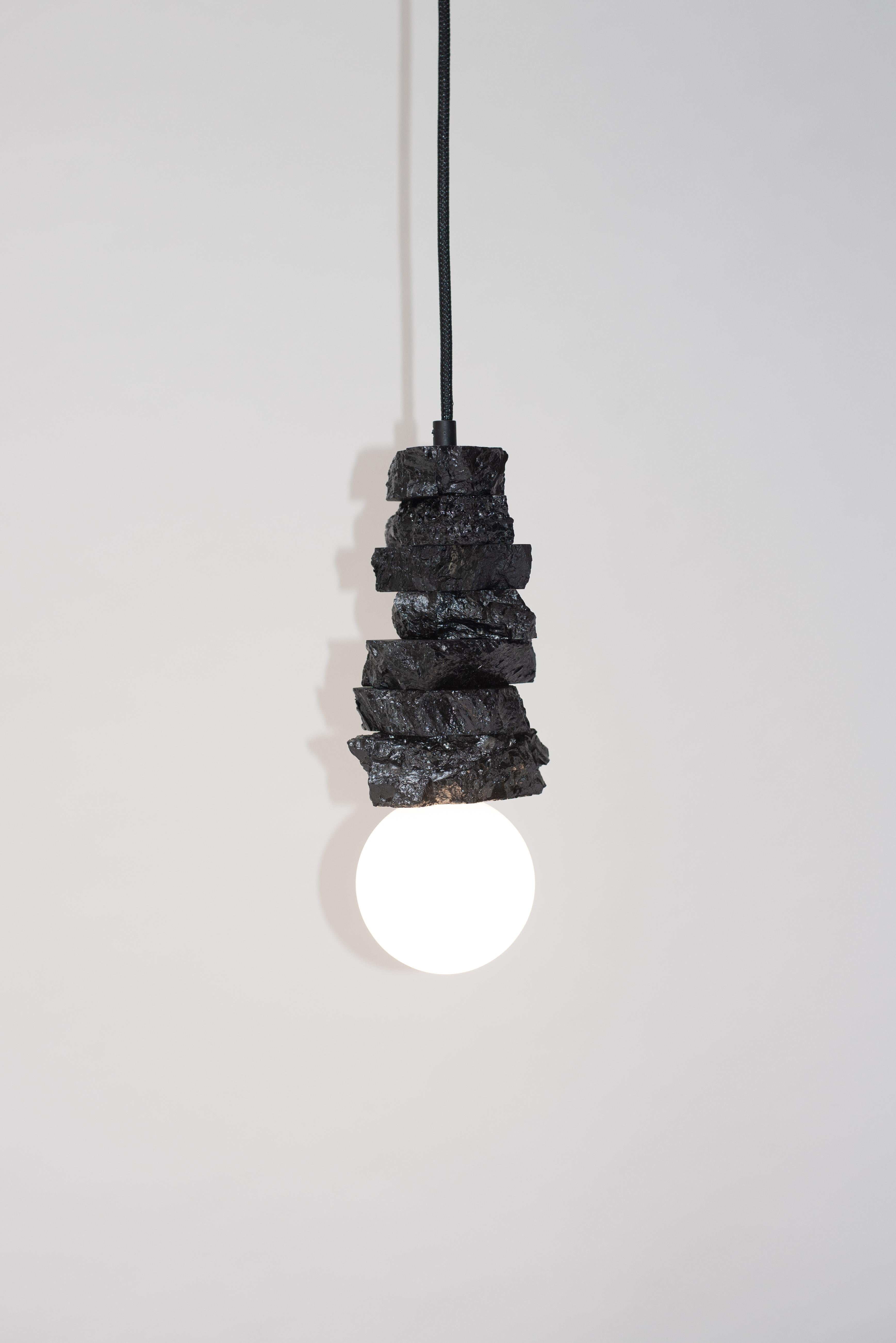 Pendant light 020 by Jesper Eriksson
Dimensions: D 20 x H 40 cm 
Materials: Anthracite coal, opal glass
Weight: 5 kg

All our lamps can be wired according to each country. If sold to the USA it will be wired for the USA for instance.

Jesper