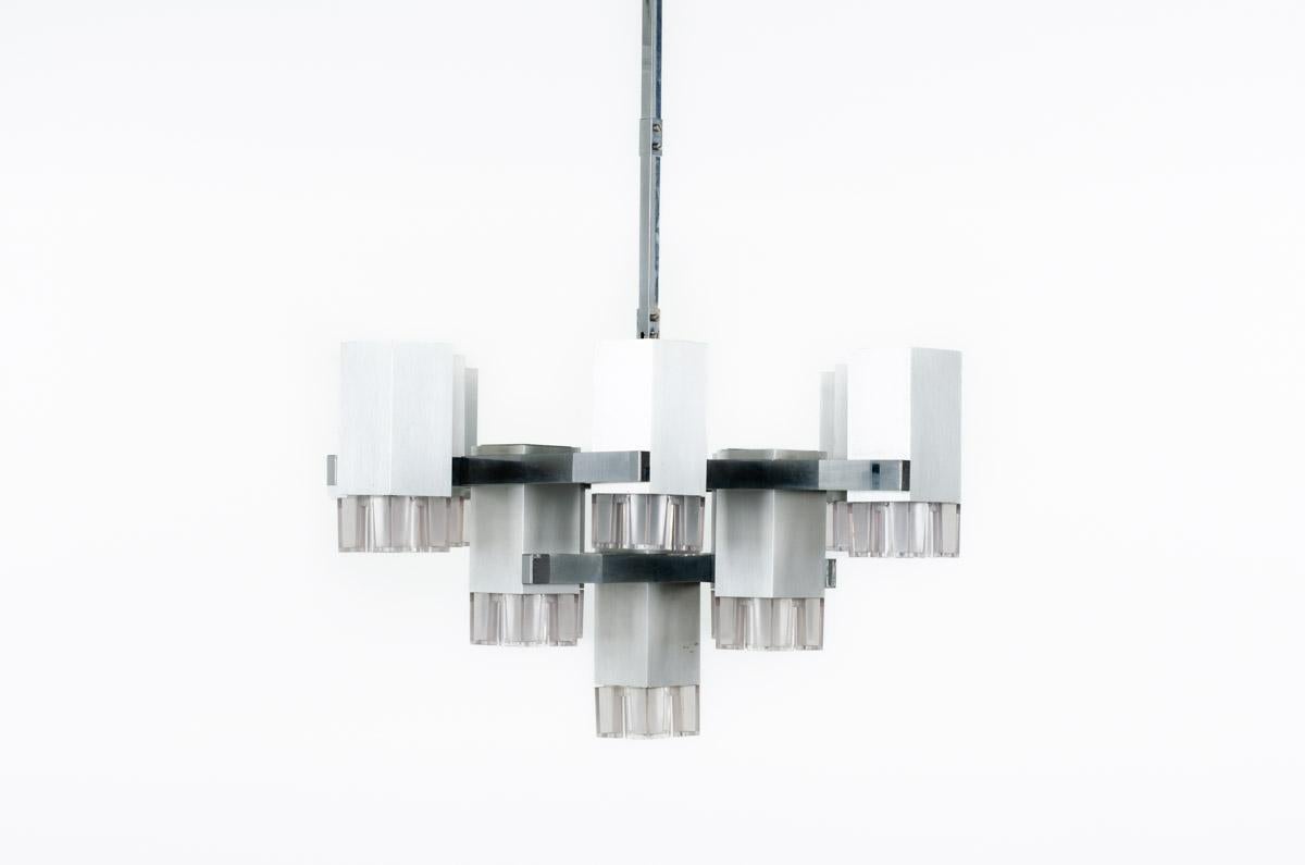 Pendant light designed by Italian Gaetano Sciolari in the seventies (stamp on the lamp, see picture)
Structure with brushed chrome and shiny chrome elements terminated by translucent Perspex
13 lights
Traces of time on the structure.