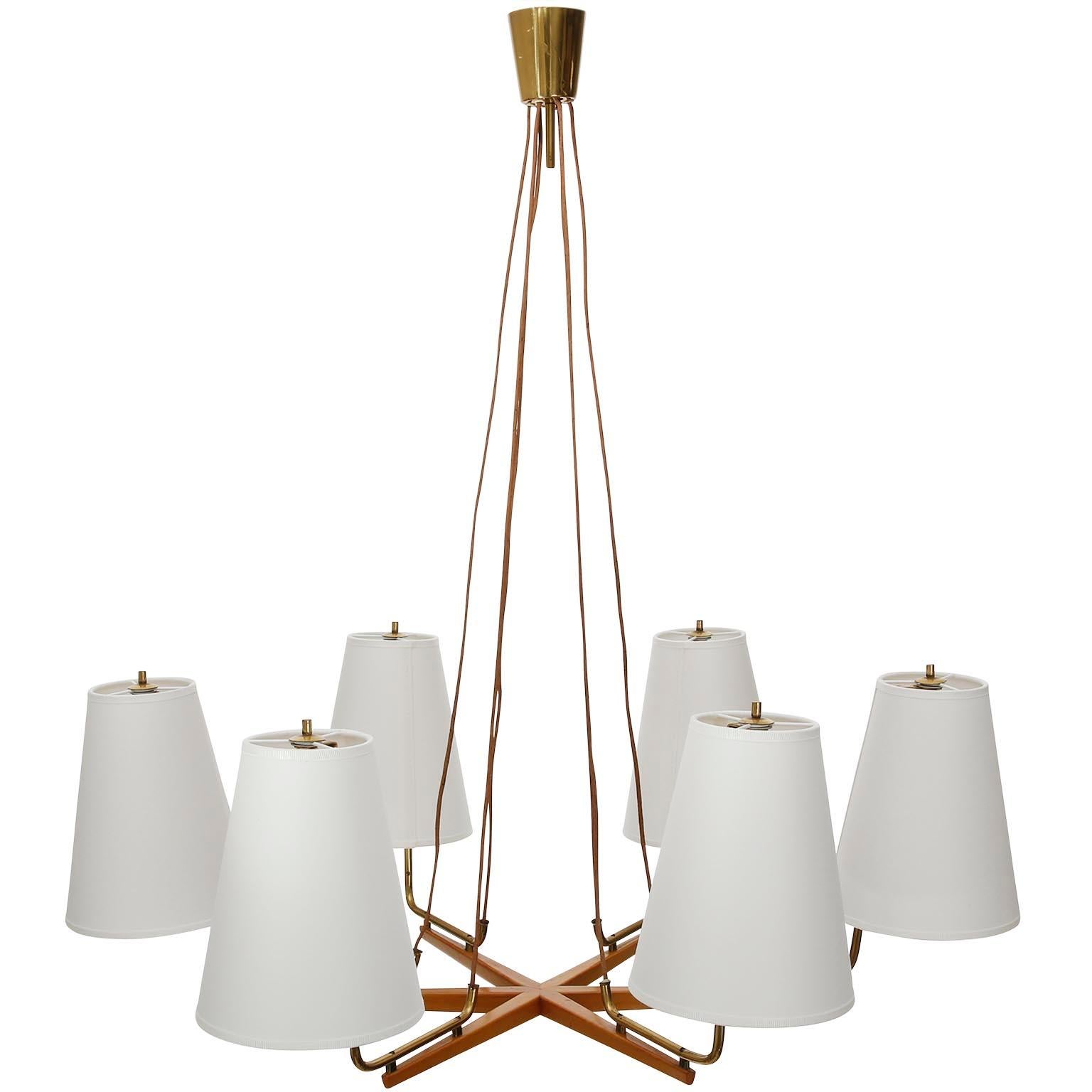 A large pendant lamp model no. 3652/6 'Holzstern' (England. wood star) by J.T. Kalmar, Austria.
J.T. Kalmar designed the chandelier Holzstern already in the 1930s. The offered light was manufactured in midcentury, circa 1960.
It is documented in the