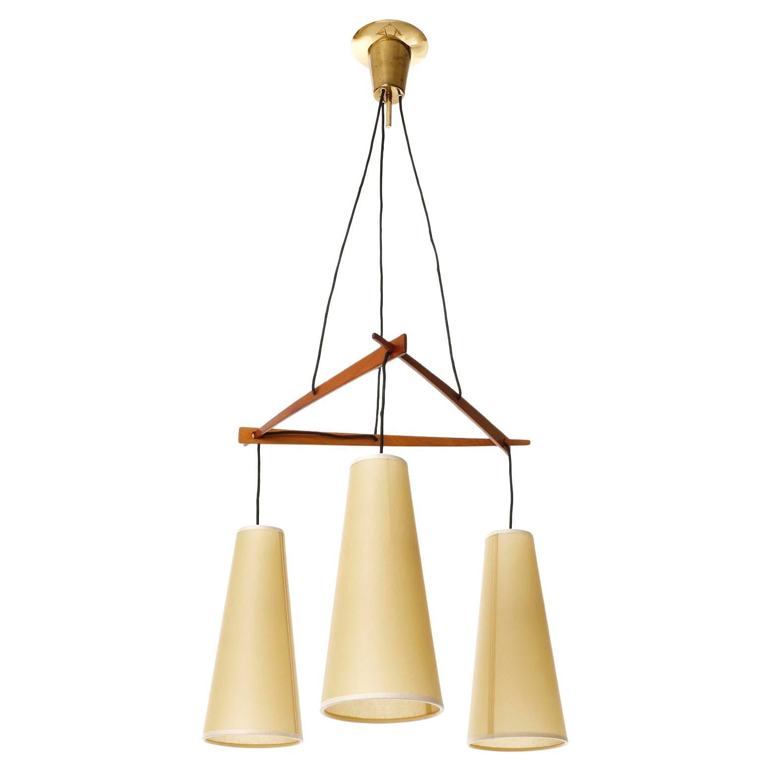 Polished Pendant Light 'Dreistich' J.T. Kalmar, Brass Walnut Wood Parchment Shades, 1960s For Sale