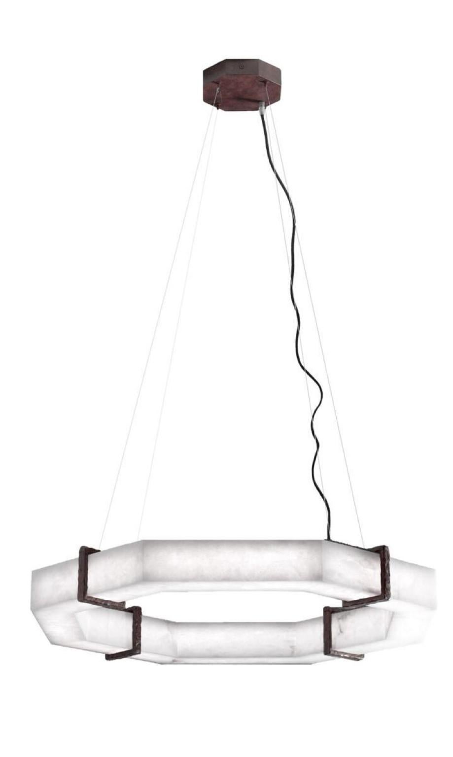 Pendant light Efesto by Alabastro Italiano
Dimensions: D 80 x H 150 cm
Materials: Italian white Alabaster, Italian hand wrought iron, Ruggine of Florence, black silk cable
Other finishes available.
Light Source 1 x strip LED 45 Watt, Tot. 4900