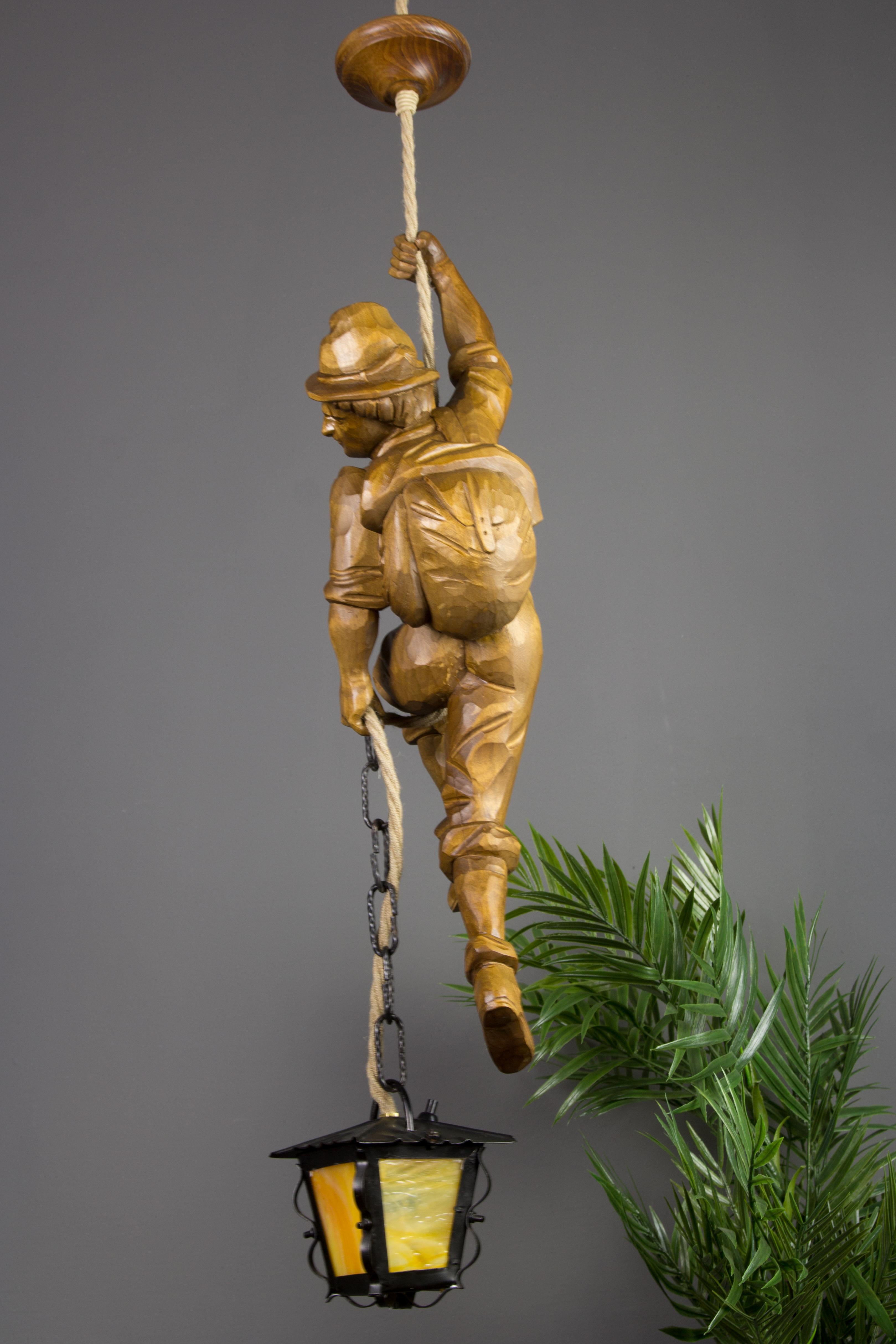 Black Forest Pendant Light Hand Carved Wood Figure Mountaineer Climber with Lantern, Germany For Sale