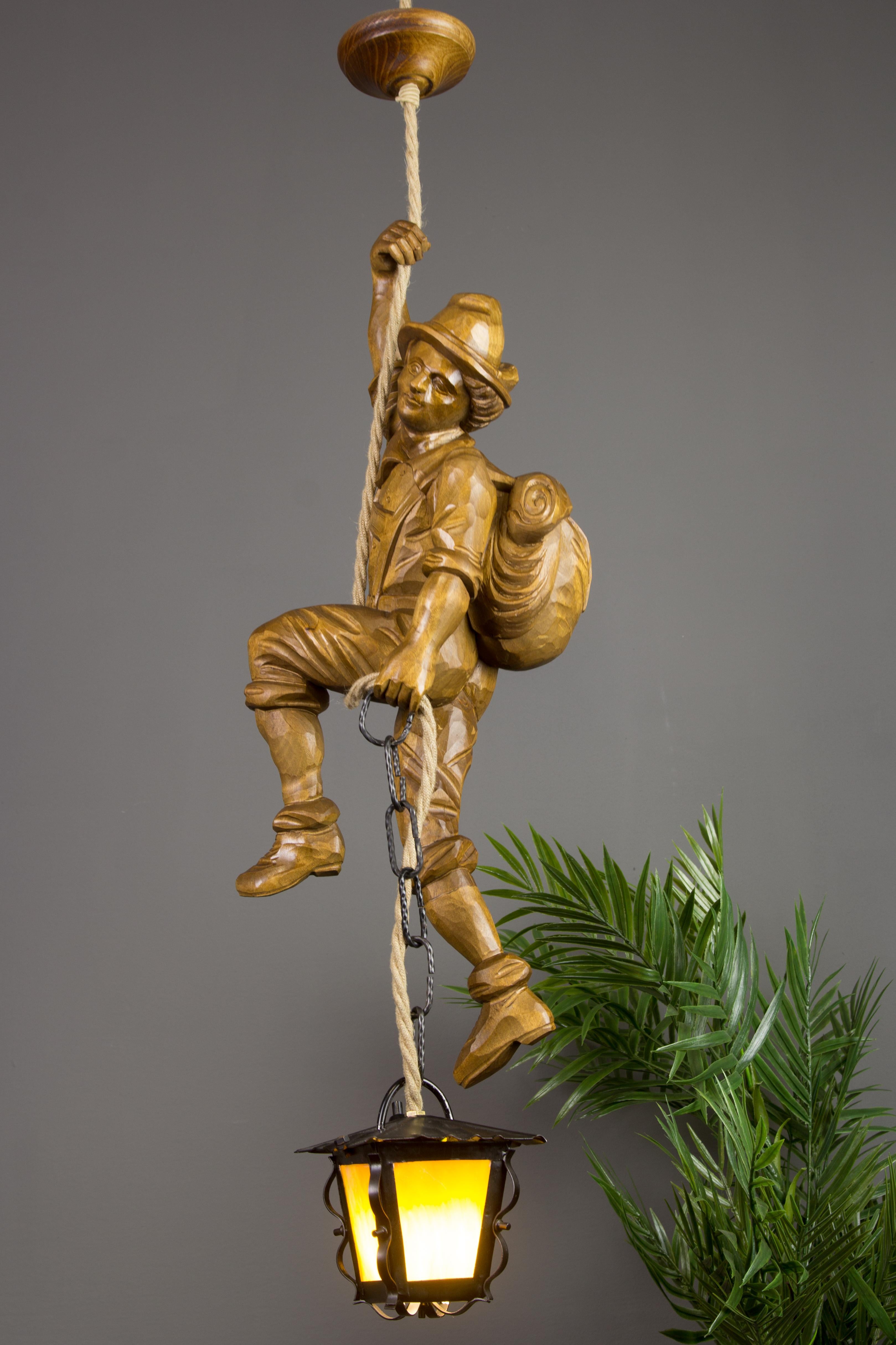 Hand-Carved Pendant Light Hand Carved Wood Figure Mountaineer Climber with Lantern, Germany For Sale