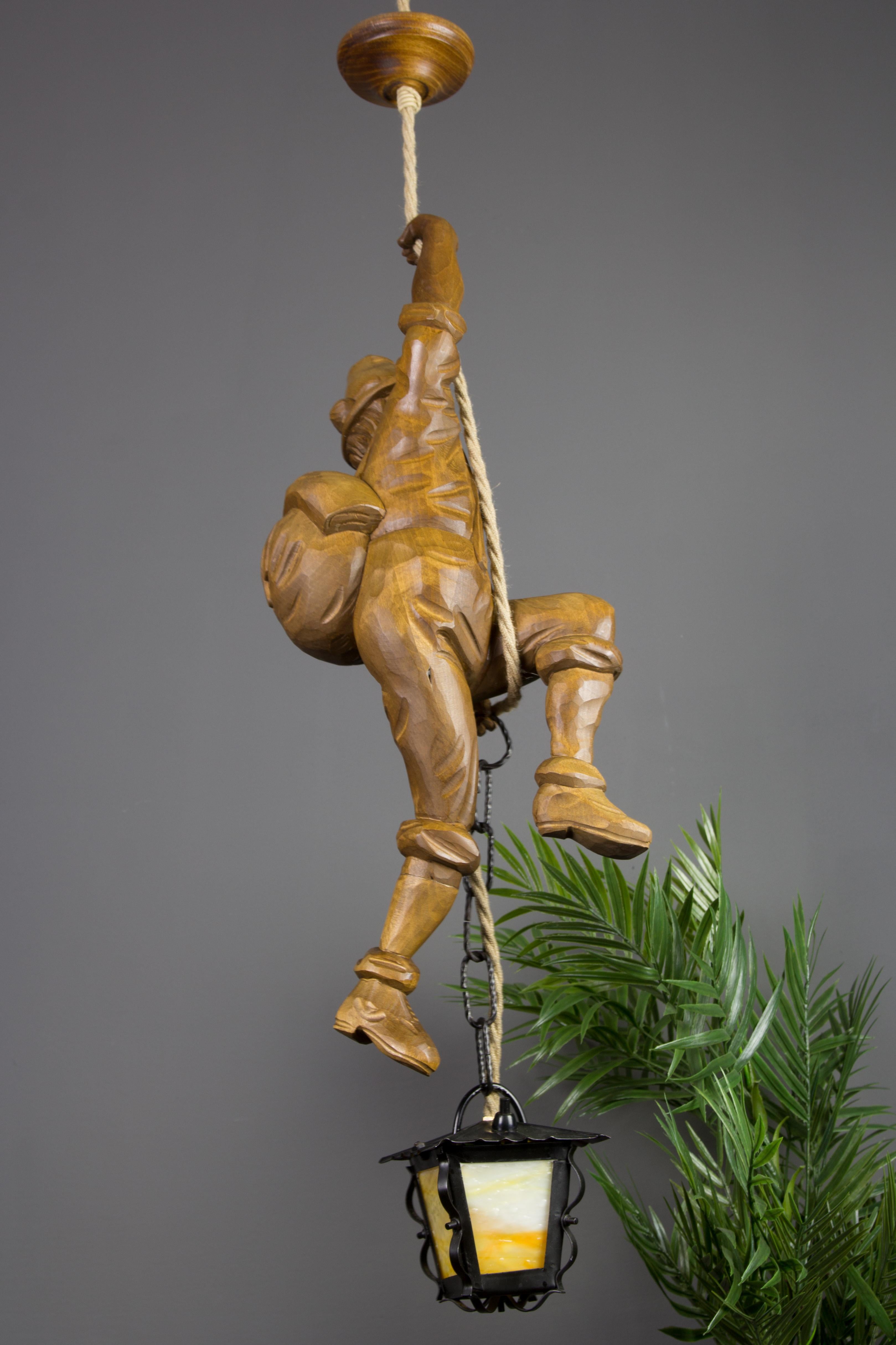 Mid-20th Century Pendant Light Hand Carved Wood Figure Mountaineer Climber with Lantern, Germany For Sale