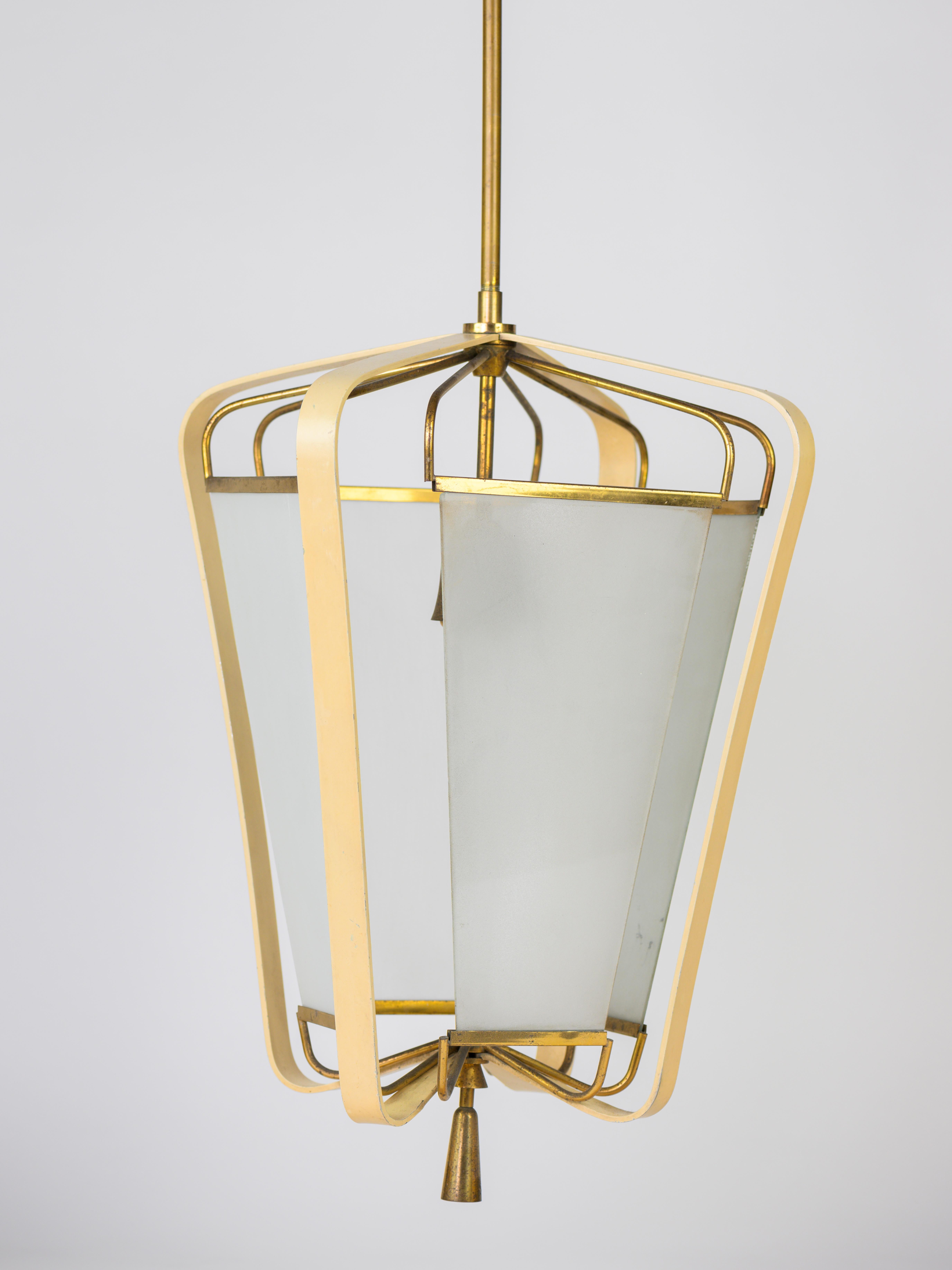 Very rare pendant light design by Angelo Lello and produced by Arredoluce circa 1950. 

Opaque glass, laquered metal and brass. 

Good condition. 

This ravishing suspension will bring elegance to an interior by its delicate lines.