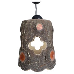 pendant light in brutalist ceramic France 1950