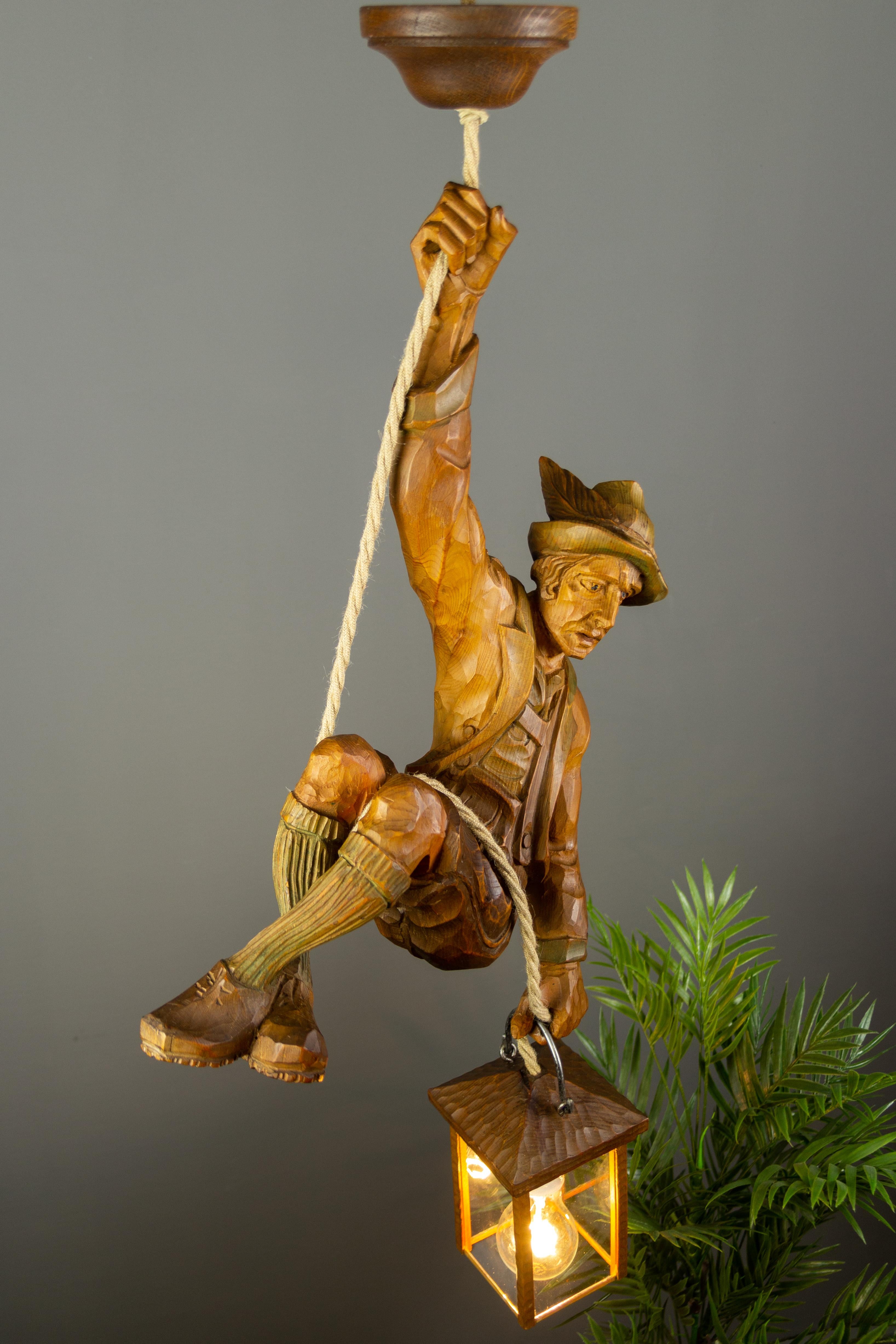 Pendant Light with a Large Wooden Figure Mountain Climber with Lantern, Germany In Good Condition For Sale In Barntrup, DE
