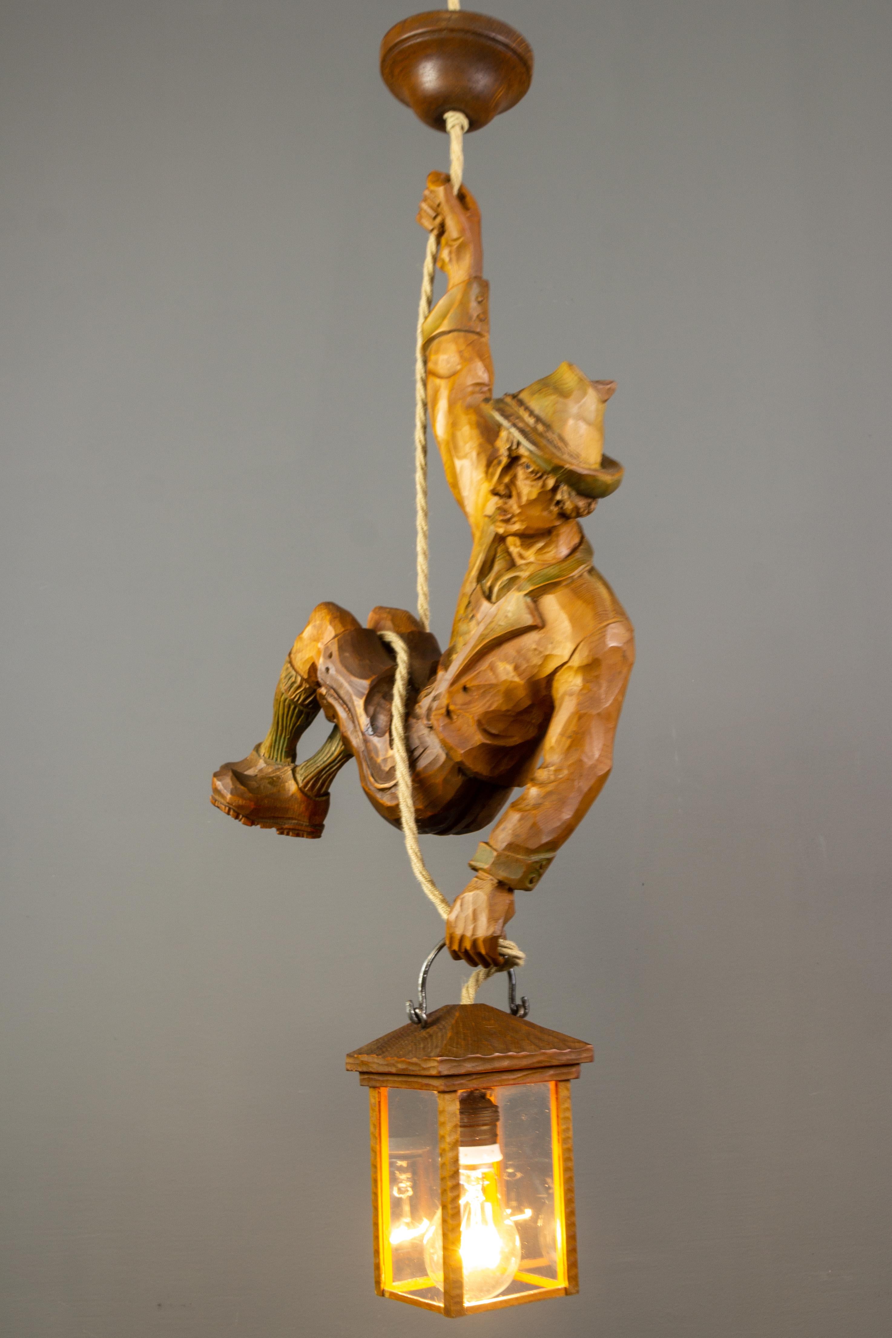 Pendant Light with a Large Wooden Figure Mountain Climber with Lantern, Germany For Sale 1