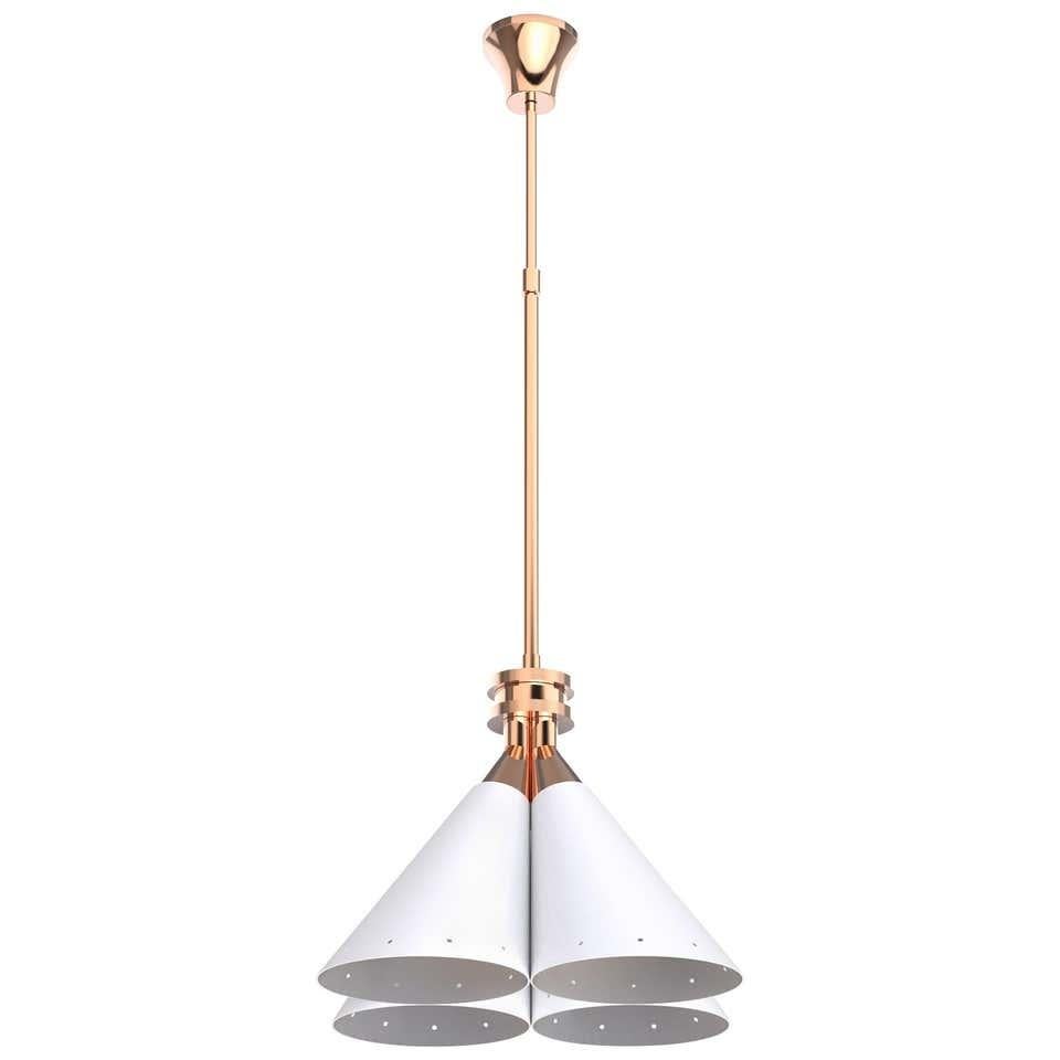Inspired by a flower bouquet, delightfull designers designed this Pendant Light, an Industrial pendant lighting. With four cone swiveling pinhole lights, this brass pendant lamp features a matte white interior and a gold powder paint inside