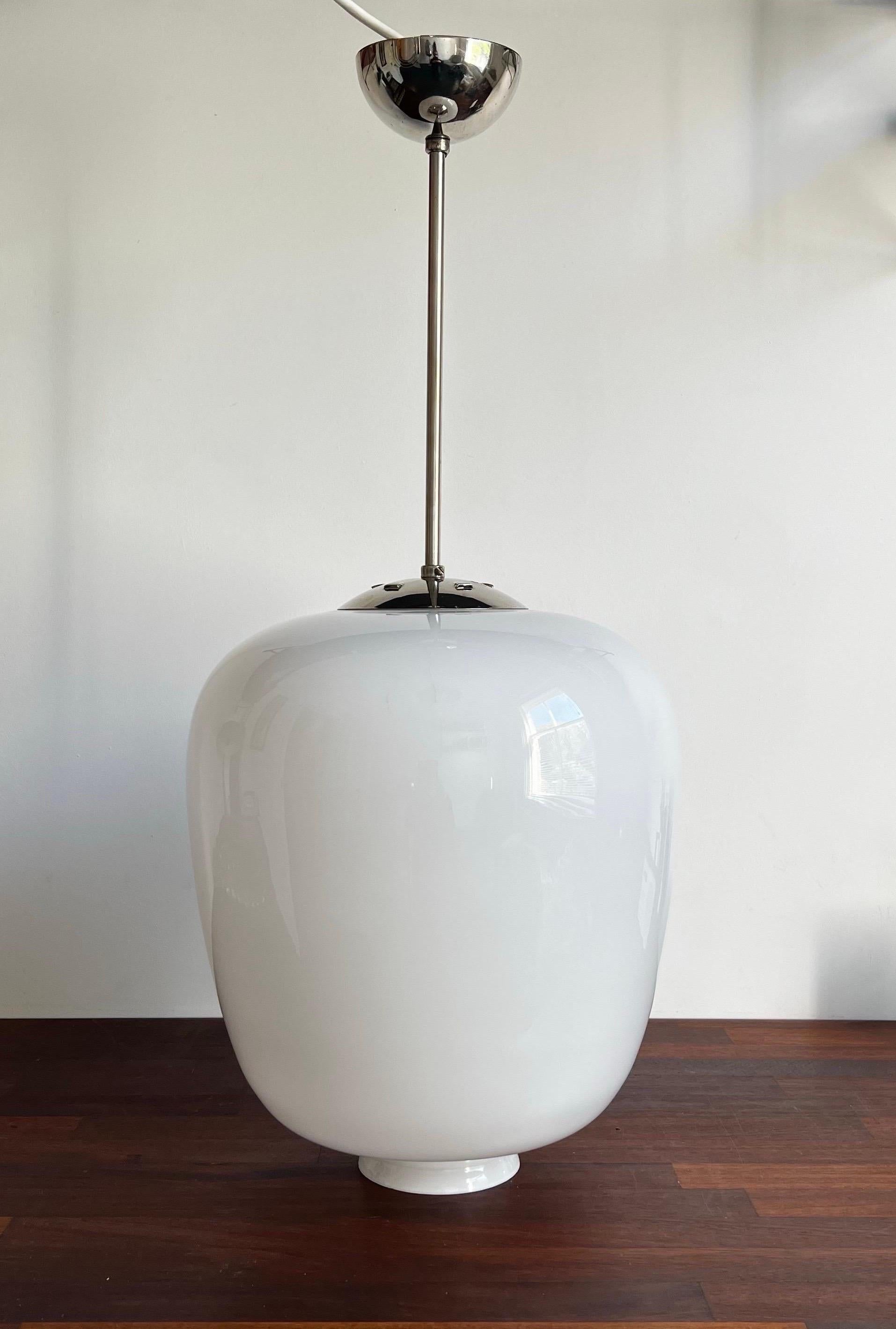 Swedish Pendant Light with Large White Glass Shade attributed to Pukeberg, Sweden For Sale
