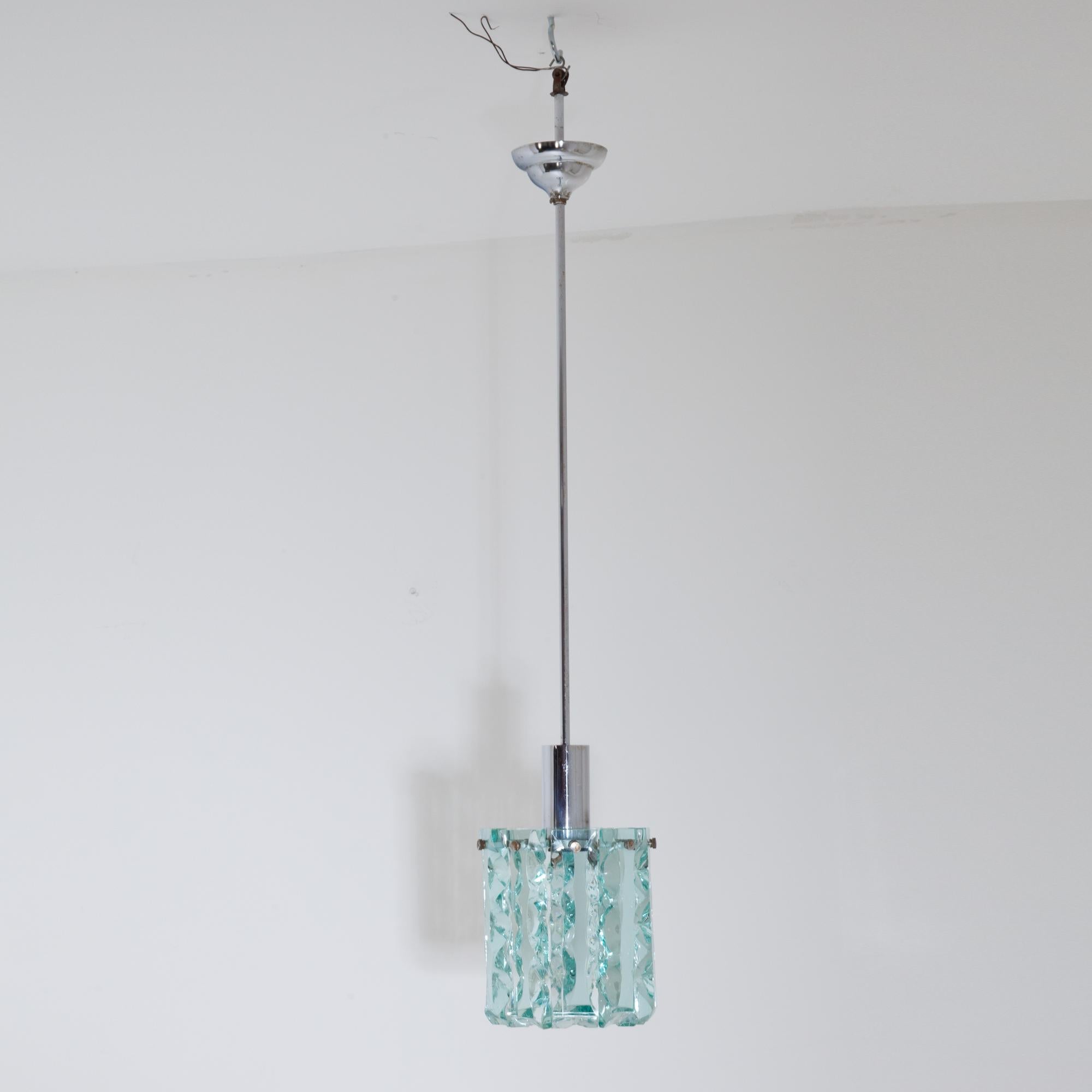Pair of pendant lights, each with a socket surrounded by narrow frosted glass rods.
