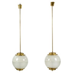 Pendant lights pair in brass and pressed glass circa 1950