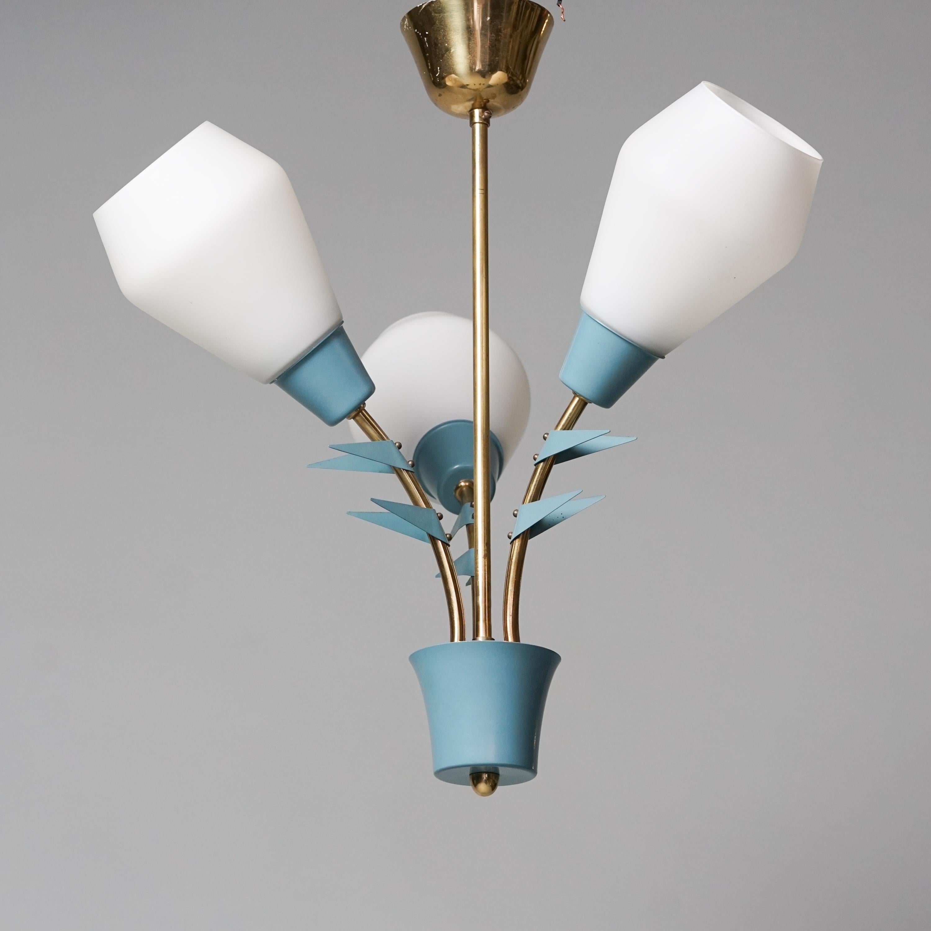 Pendant, designed by Maria Lindeman, manufactured by Idman Oy, 1950s. Painted metal and brass with milk glass shades. Marked. Good vintage condition minor patina consistent with age and use. Beautiful leaf details. 