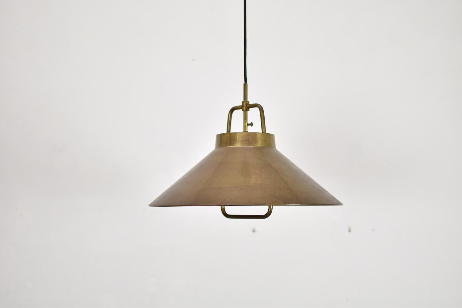 Pendant Model P 295 designed by Fritz Schlegel for Lyfa, Denmark 1960s. This pendel is made out of solid brass and is adjustable in height.