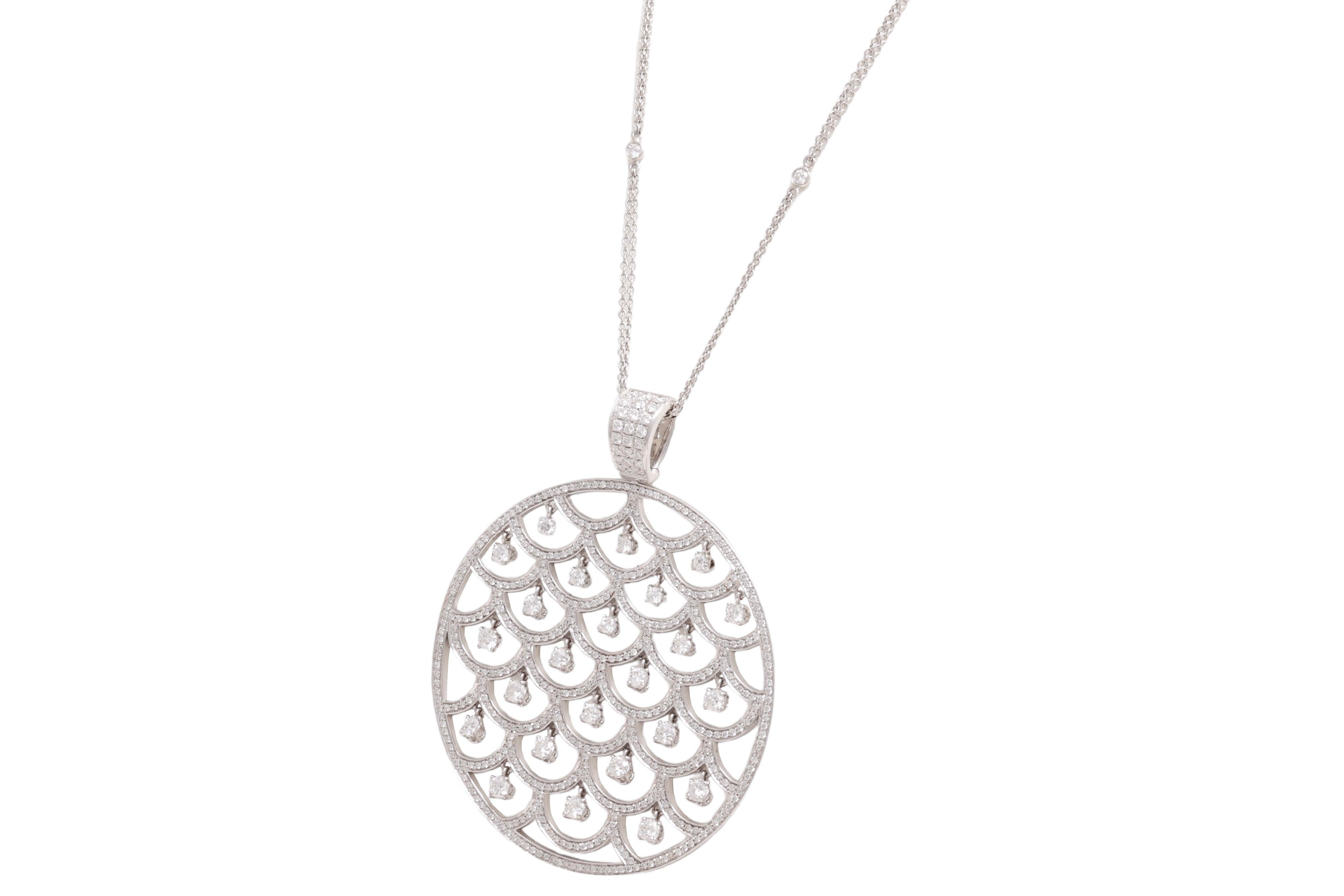 Magnificant Pendant Necklace in 18 kt. White Gold With 7.6ct. Brilliant Cut Moving Diamonds 

Amazing Pendant , as the bigger diamonds are moving and dancing whenever you move !

Diamonds: Brilliant cut diamonds together in total 7.6 ct.

Material: