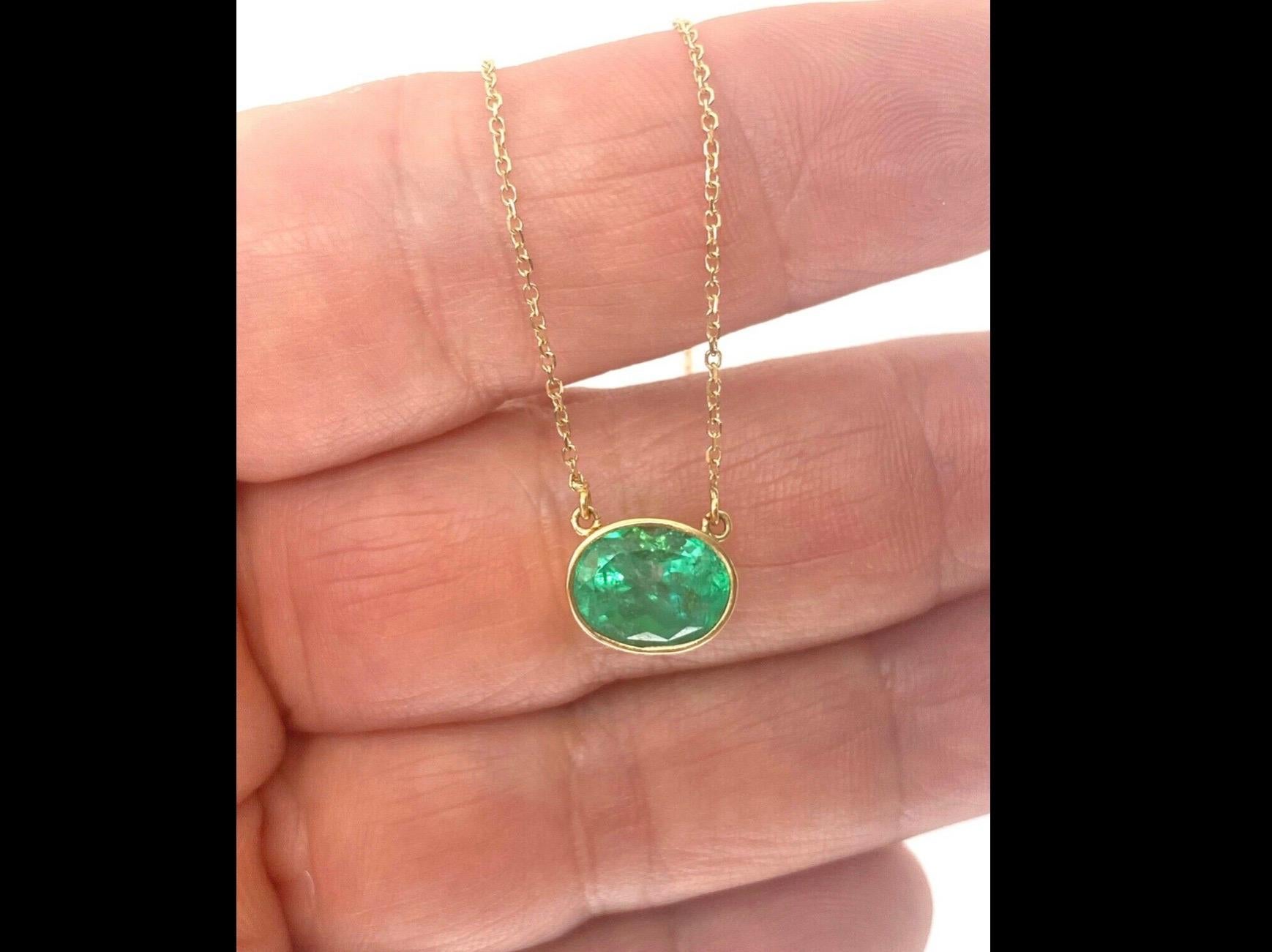 Stylish Pendant Necklace Natural Colombian Emerald 18K Yellow Gold 20in
Featuring a natural Colombian emerald oval cut, with visible natural inclusions, 3.50 carat, the emerald measurements 9.00x11.00mm, displaying a vivid medium green color. 
18K