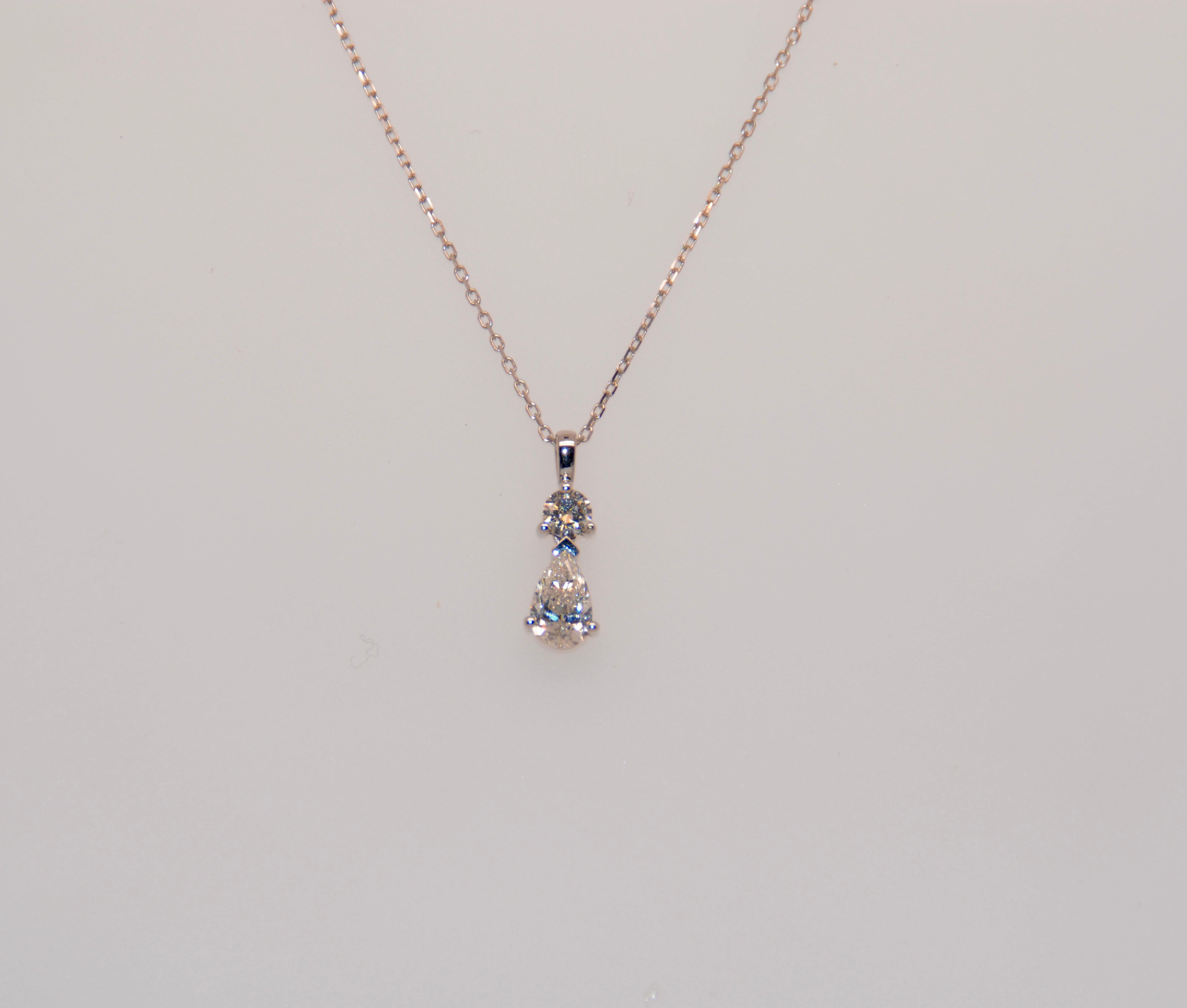 Pendant Necklace White Gold Diamond 

Gorgeous 18 carat white gold and diamond pendant. The pendant is topped with 2 diamonds. 1 brilliant cut diamond weighing 0.160 carats, color H, purity SI. 1 pear-shaped diamond, 540 carats in weight, H color,