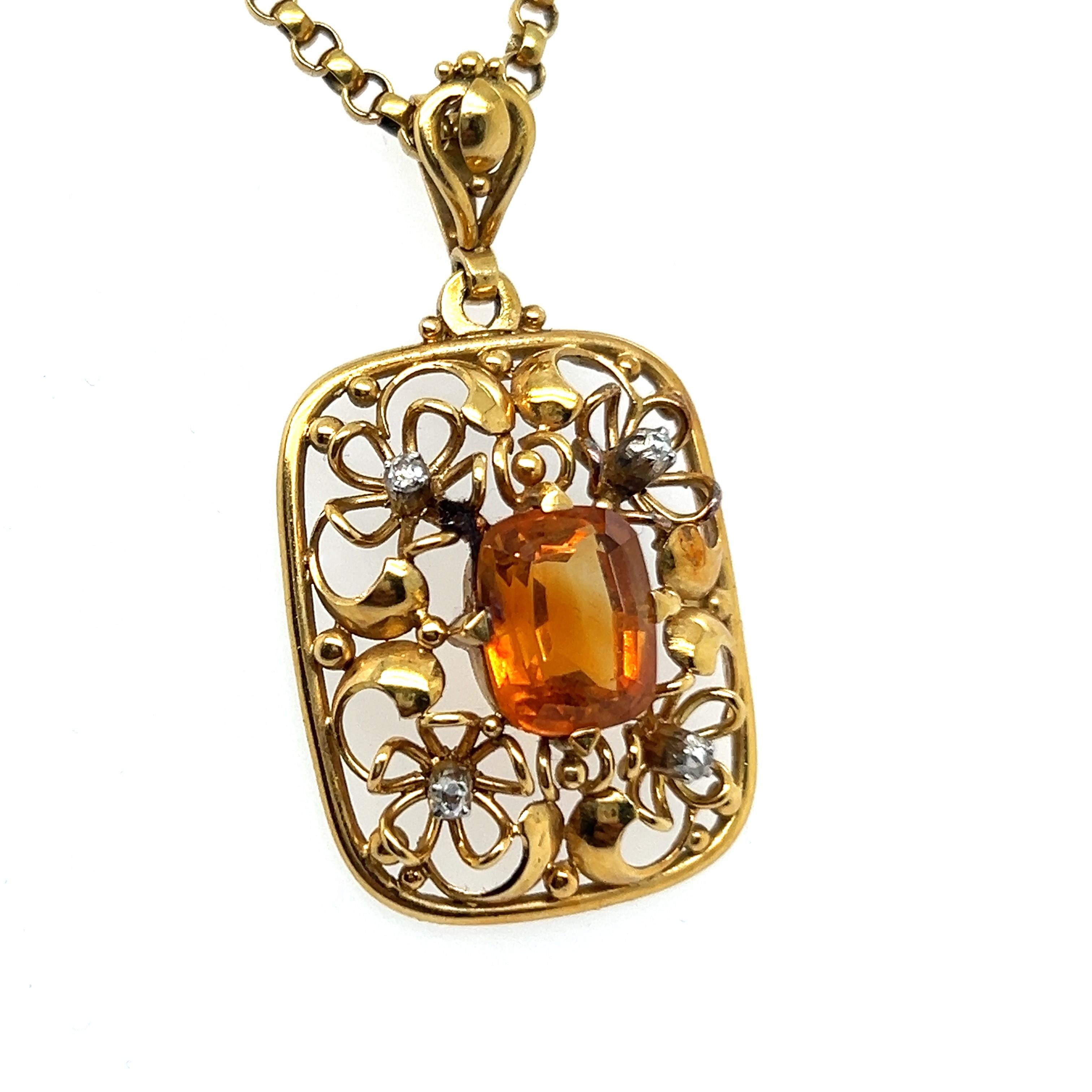 This exquisite pendant necklace is a true masterpiece of jewelry artistry.

Crafted in 18 Karat yellow gold, it features a pendant with an openwork ornament reminiscent of a beautiful garden. At the heart of the pendant is a vivid citrine, giving a