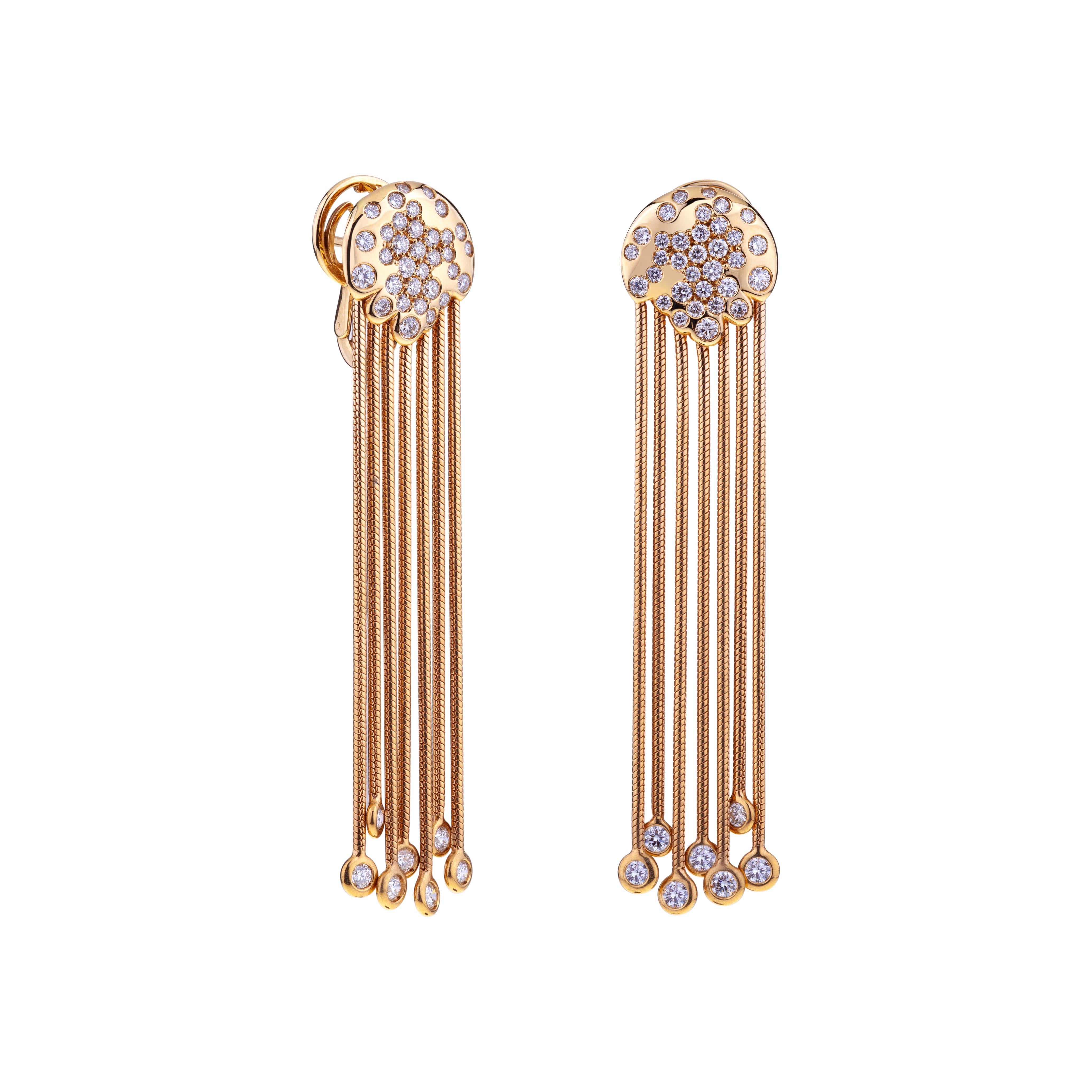 Pendant Rose Gold Earrings with seven threads and diamonds.
Long Pendant Earrings with seven gold threads, pave diamond on a top gold circle and at the bottom of each threads.
The original design recalls the jellyfish shape for sea lovers.  
Pendant