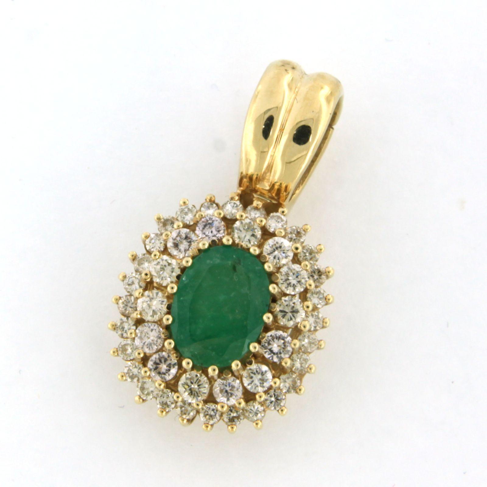 Brilliant Cut Pendant set with emerald and diamonds 14k yellow gold For Sale