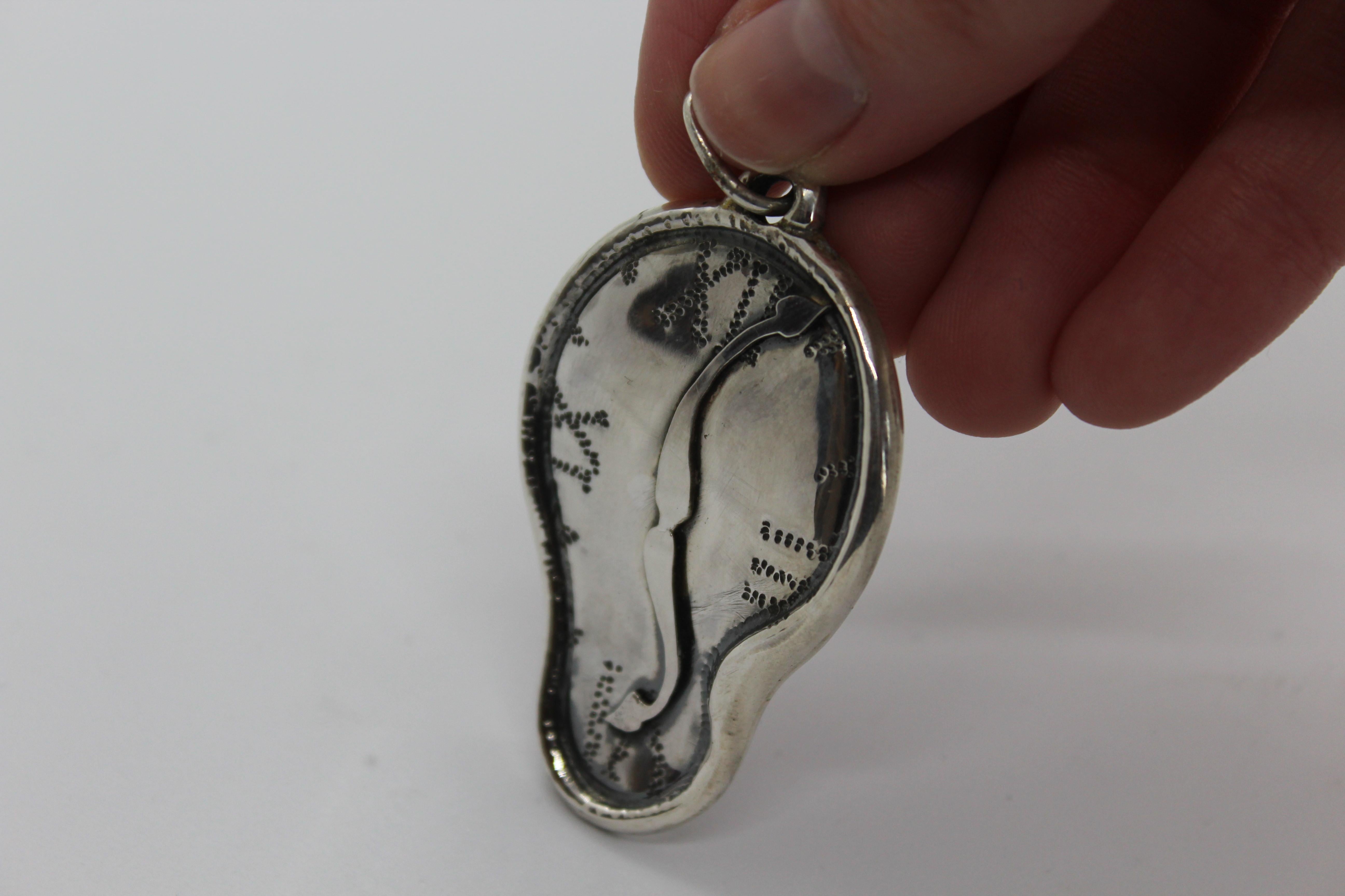 The “Dalí” pendant is part of our jewelry line “Homage to the ancestors”, inspired by famous oeuvres of great artists. Specifically, this pendant represents the well- known painting “The persistence of Memory” by Dalí. All our sterling silver pieces
