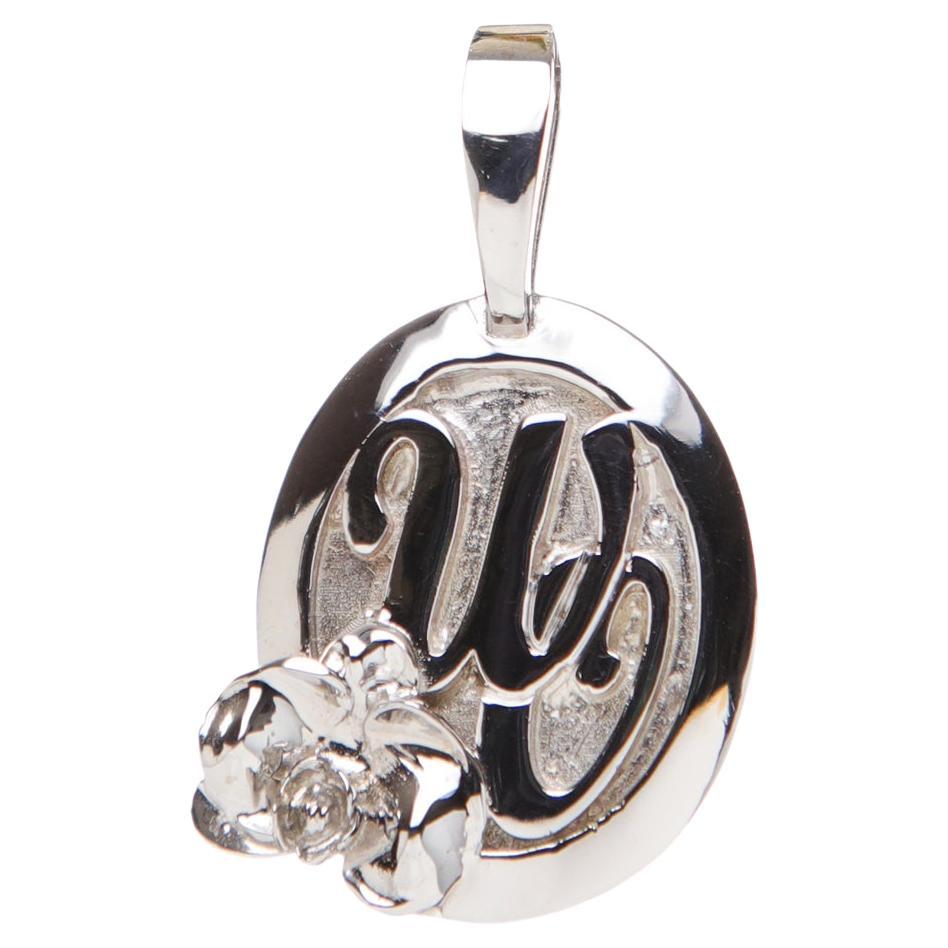 Pendant, White Gold Logo Charm Embossed with a Moth Orchid 'Phalaenopsis' For Sale