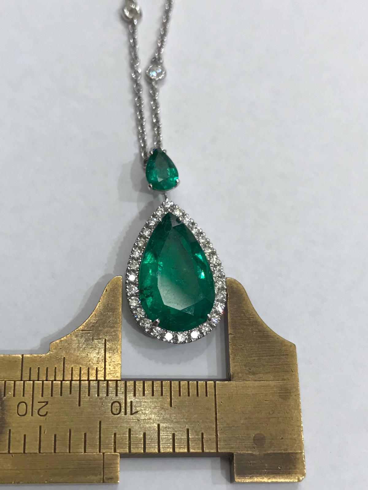 Contemporary Pendant with a Certified Drop Emerald, Diamonds and Pear Cut Emerald on Top For Sale