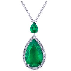 Pendant with a Certified Drop Emerald, Diamonds and Pear Cut Emerald on Top