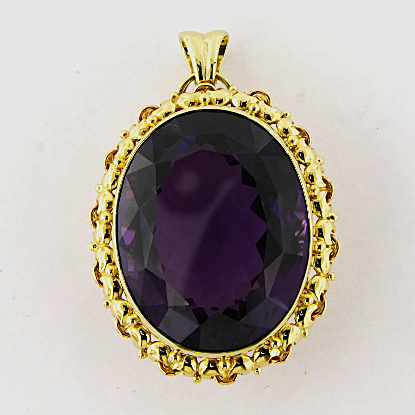 Pendentif en or jaune 14k serti d'une améthyste d'une valeur totale d'environ 54,00ct - 31,1 grammes

Description détaillée

Les dimensions du pendentif sont de 4,8 cm de haut et 3,3 cm de large.

poids total : 31,1 grammes

avec :

- 1 améthyste