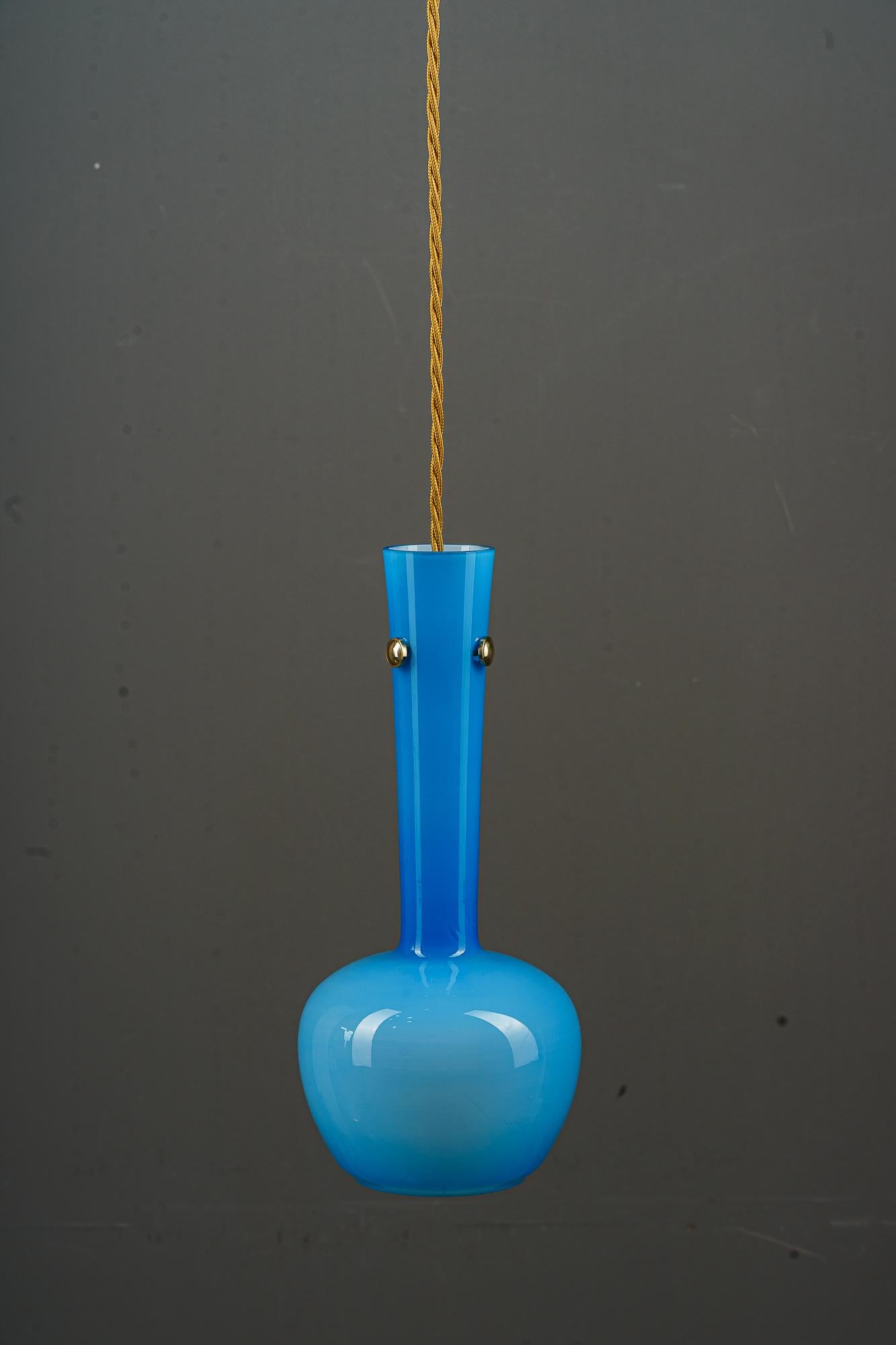Brass Pendant with blue glass shade vienna around 1960 For Sale