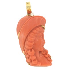 Pendant with coral and brilliant cut diamond up to 0.03ct 19.0 grams 18k gold