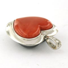 Pendant with coral, hematite and brilliant cut diamonds up to 1.20ct 18k gold