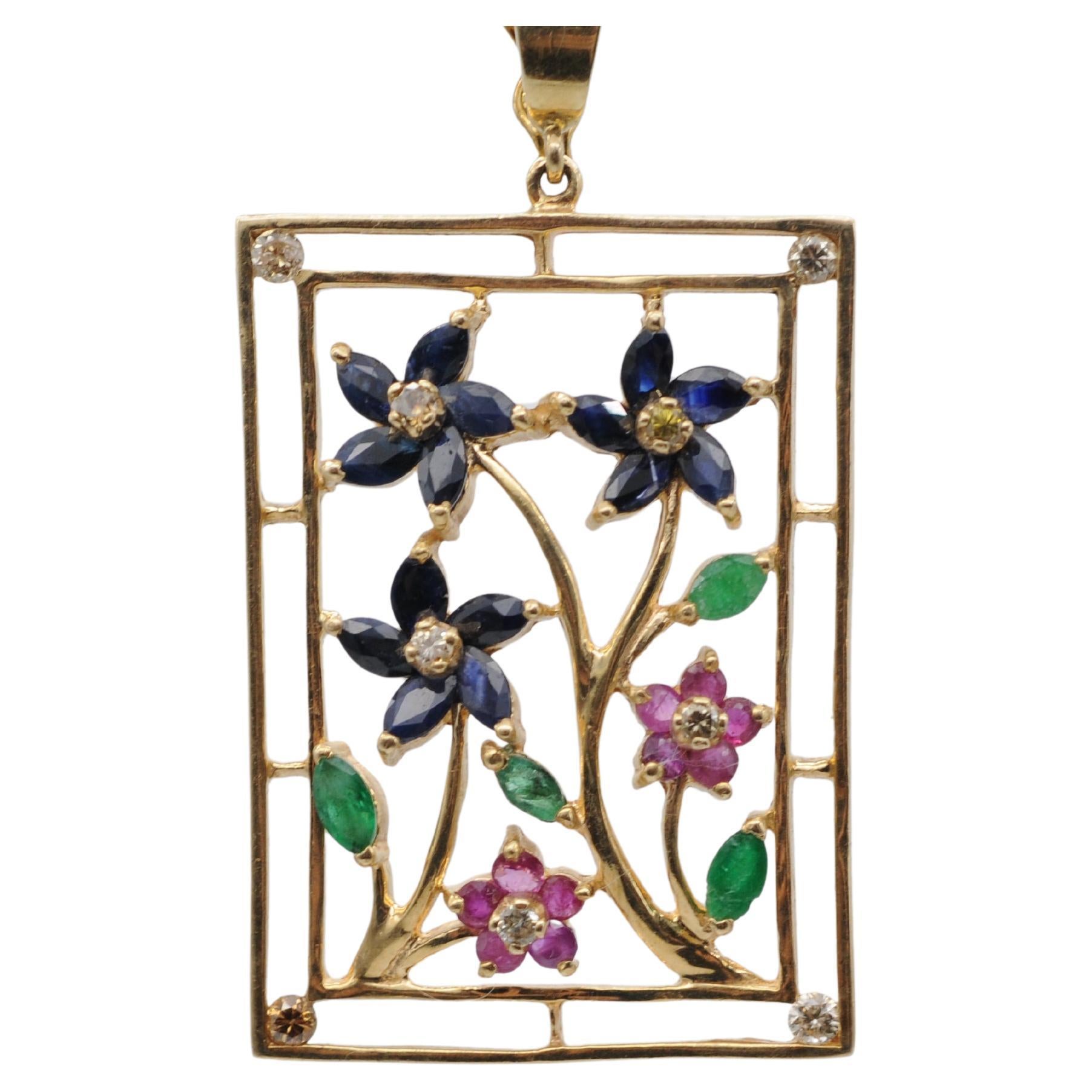 ciondolo con diamanti colorati rubini smeraldi e zaffiri, realizzato in 14 ct.