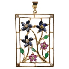 Antique pendant with fancy colored diamonds rubies emeralds sapphires crafted in 14k