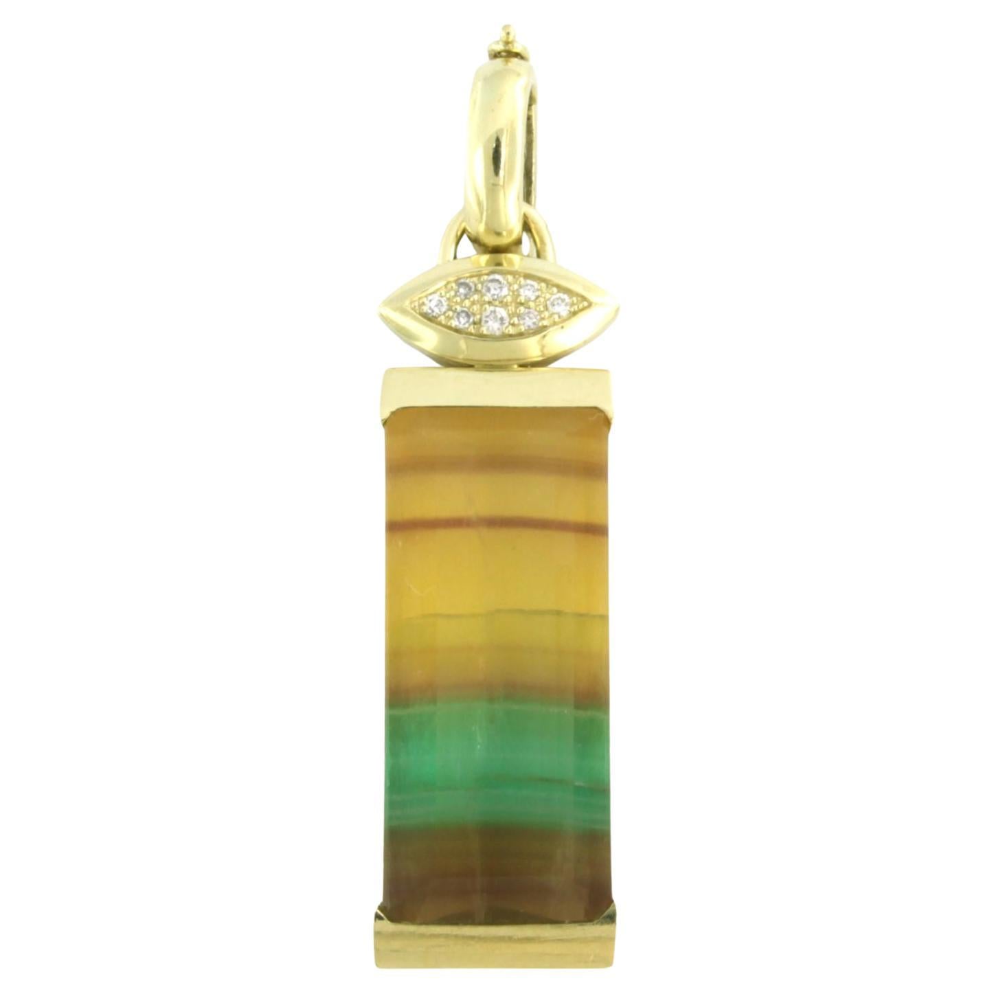 Pendant with fluorite and brilliant cut diamonds up to 0.12ct 14k yellow gold