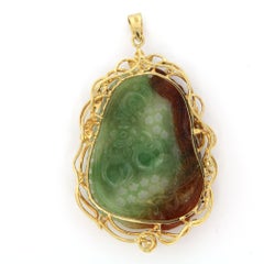 Pendant with jade and brilliant cut diamonds up to 0.20ct 18k gold 15.2 grams