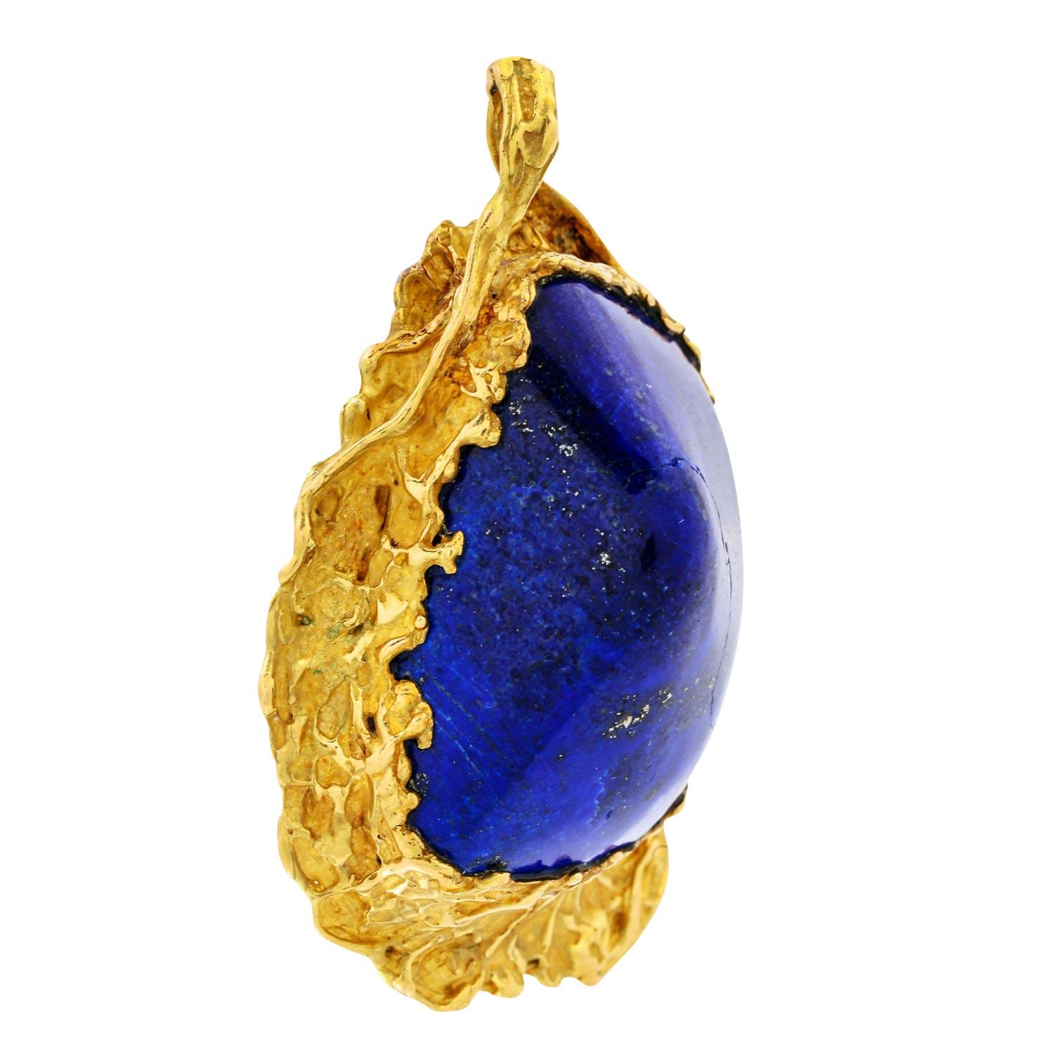 of approx. 38.5x29x21.5 mm (LBT), color treated, faceted on the back, GG 18K, total 53.1 g, length approx. 6 cm, 20./21. Century, slight signs of wear, unique jewellery!

 Pendant with large lapis lazui of approx. 38.5x29x21.5 mm (LWD), color