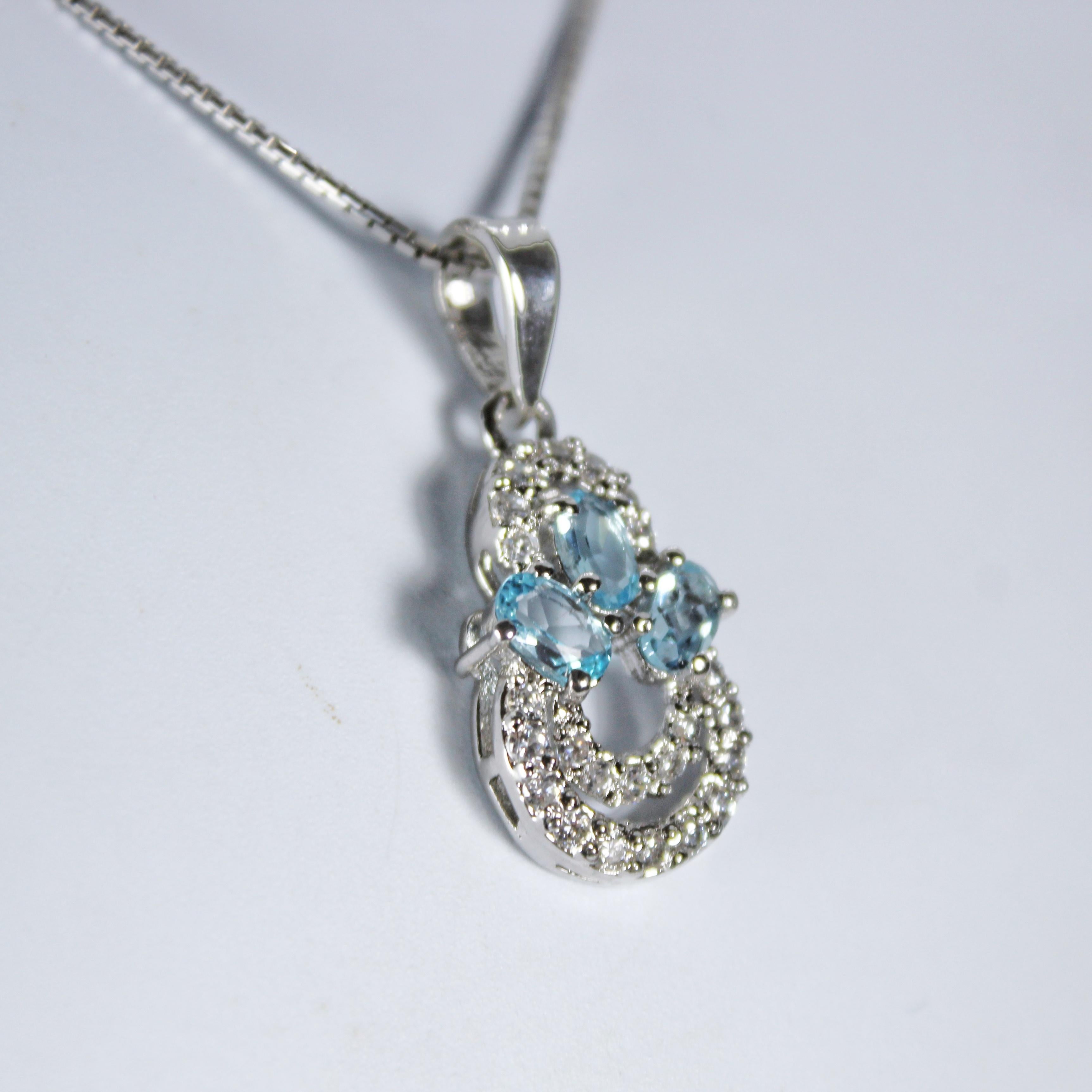 Product Details:

Metal of pendant - Sterling Silver
Diamonds - synthetic
Pendant size (without bail) - 17 x 10 mm
Pendant gross Weight - 2.19 Grams
Gemstones - Aquamarine
Total stone weight - 0.50 Carat
Stone shape - Oval
Stone size - 5 x 3